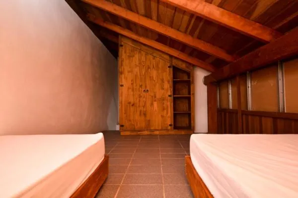 Bed in Pousada Praia de Bombinhas