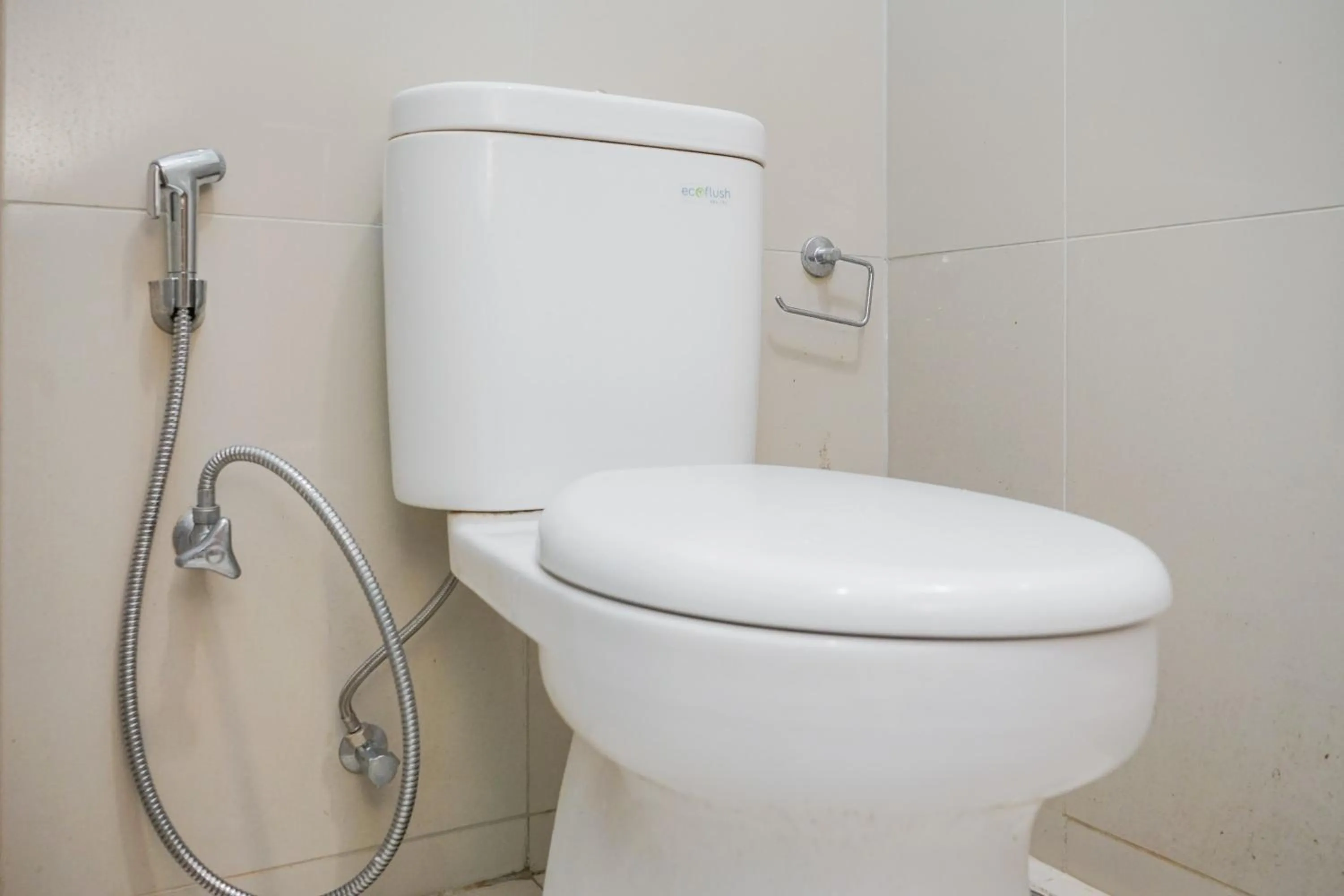 Bathroom in Modern Studio Apartment at Tree Park Cikokol By Travelio