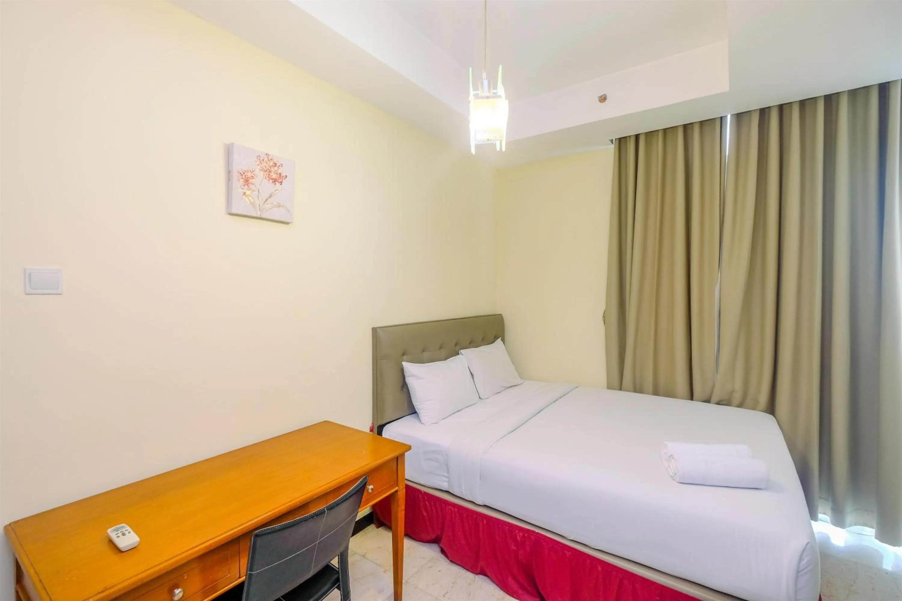 Bed in Exclusive with City View 3BR Apartment Bellagio Residence By Travelio