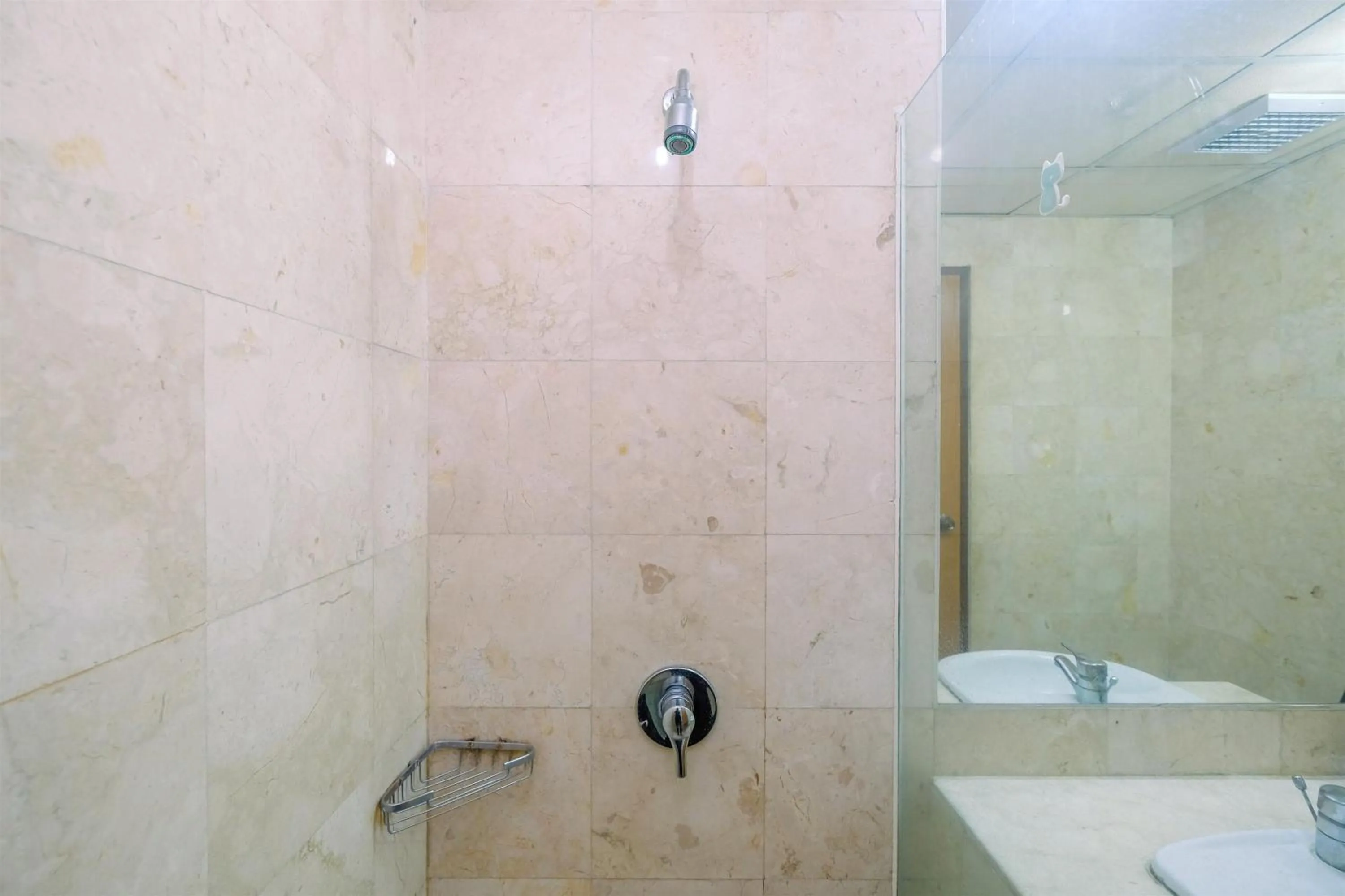 Bathroom in Exclusive with City View 3BR Apartment Bellagio Residence By Travelio