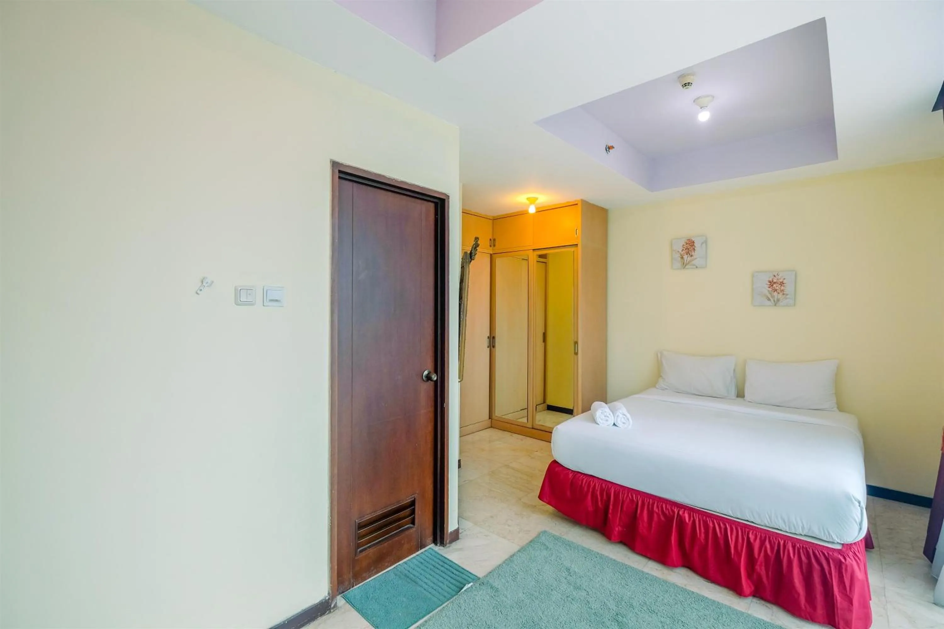 Bed in Exclusive with City View 3BR Apartment Bellagio Residence By Travelio