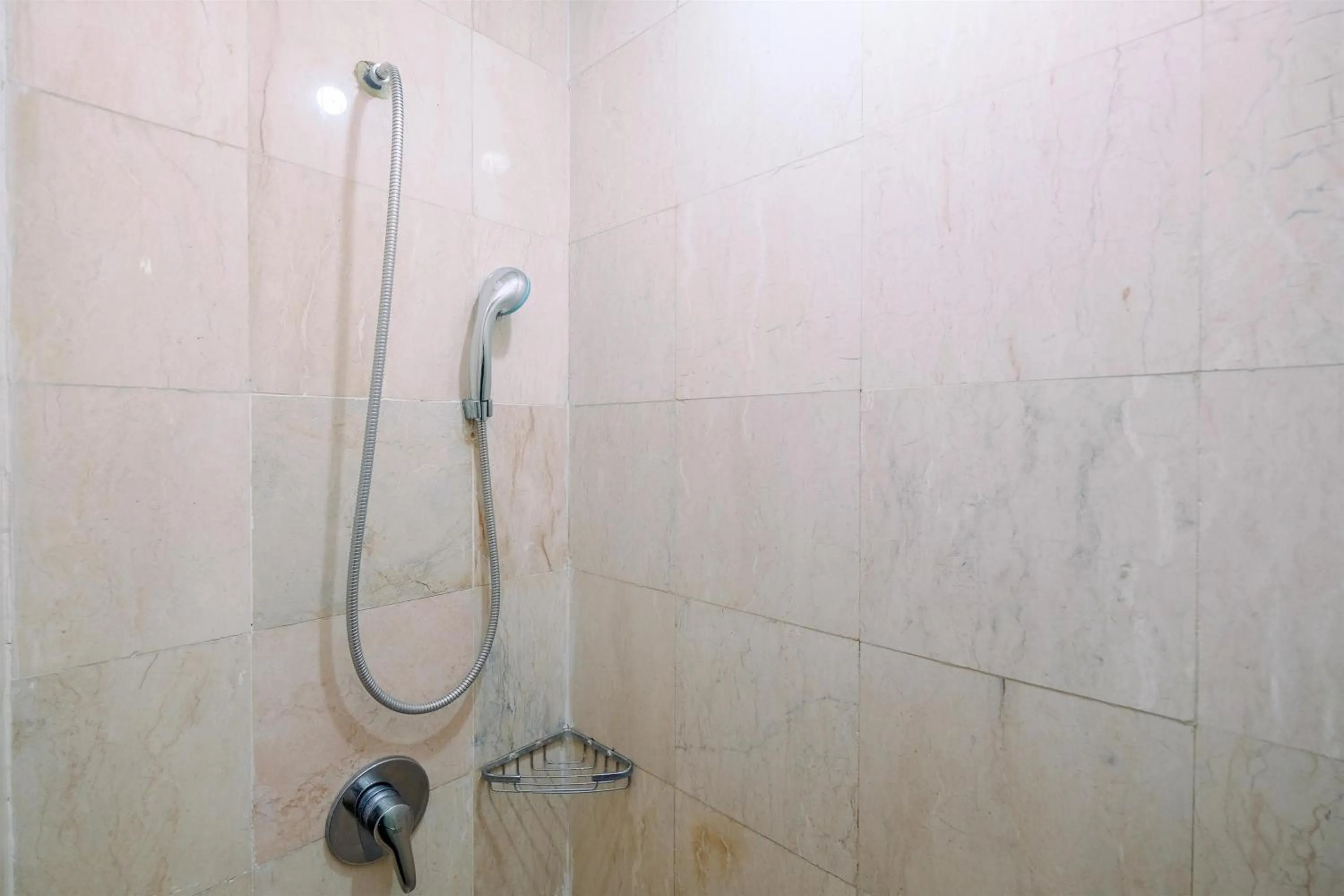 Bathroom in Exclusive with City View 3BR Apartment Bellagio Residence By Travelio