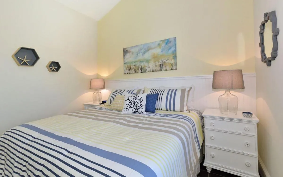 Bed in Seahorse Beach House by Beach Retreats