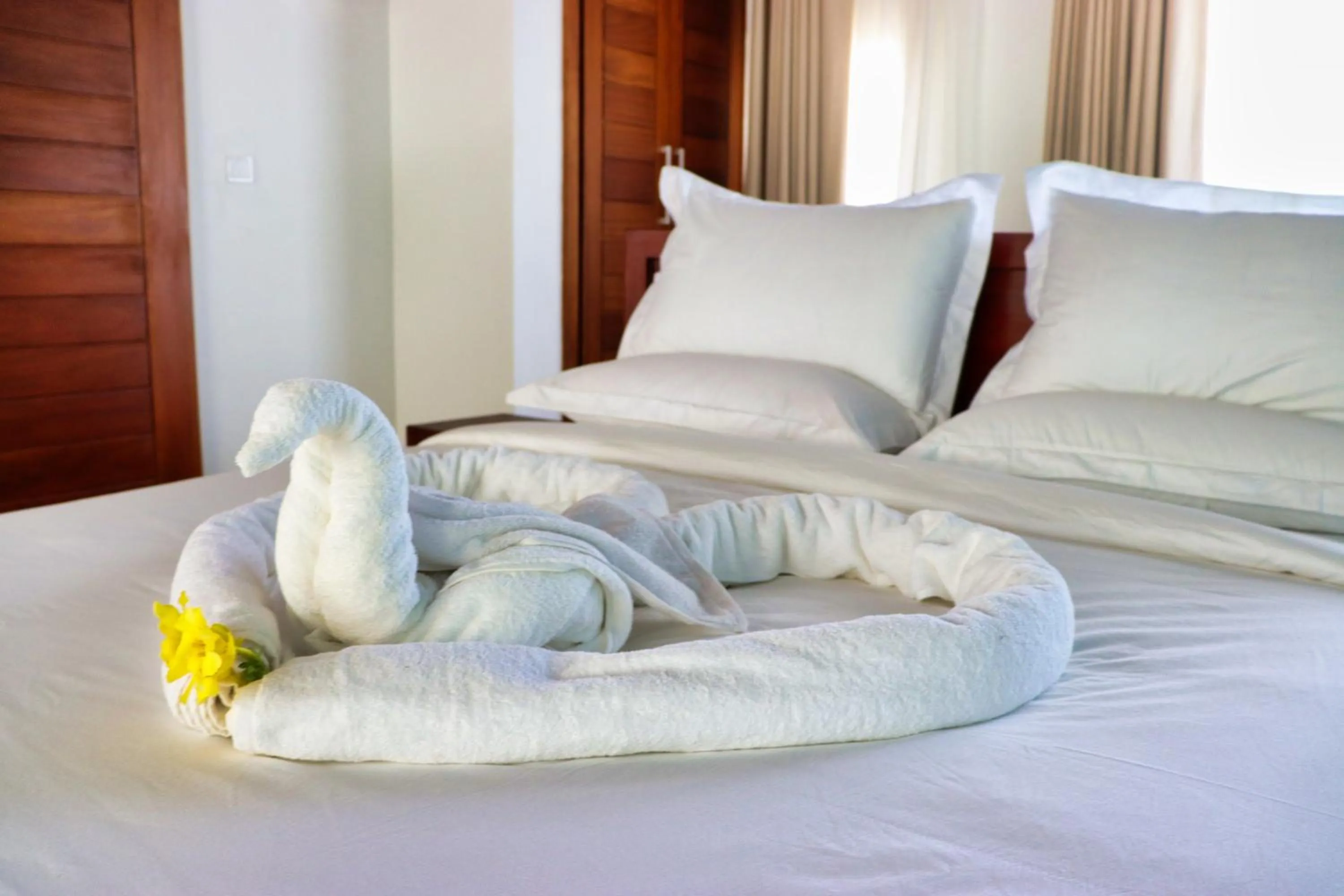 Bed in Searenity Beach Villa