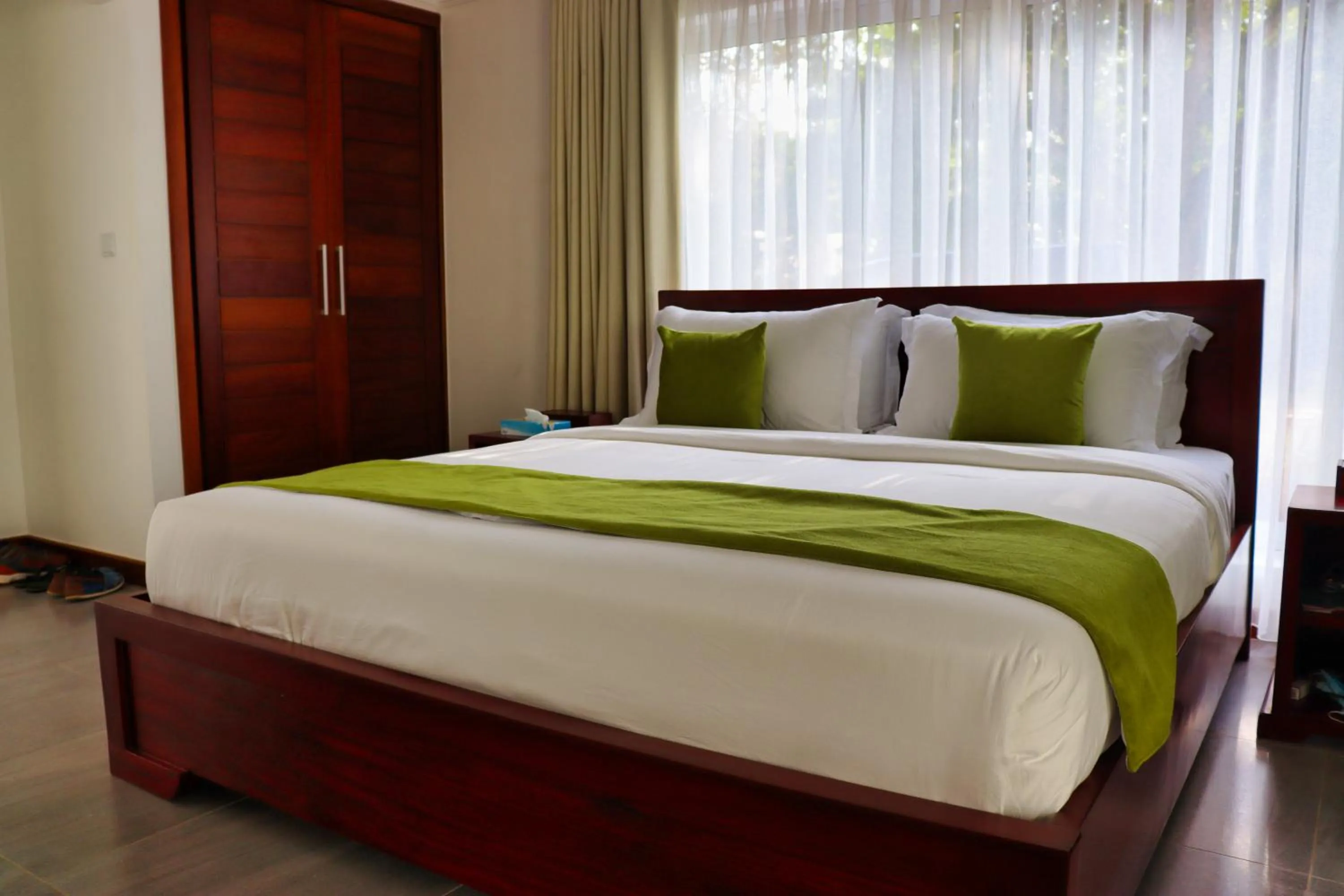 Bed in Searenity Beach Villa
