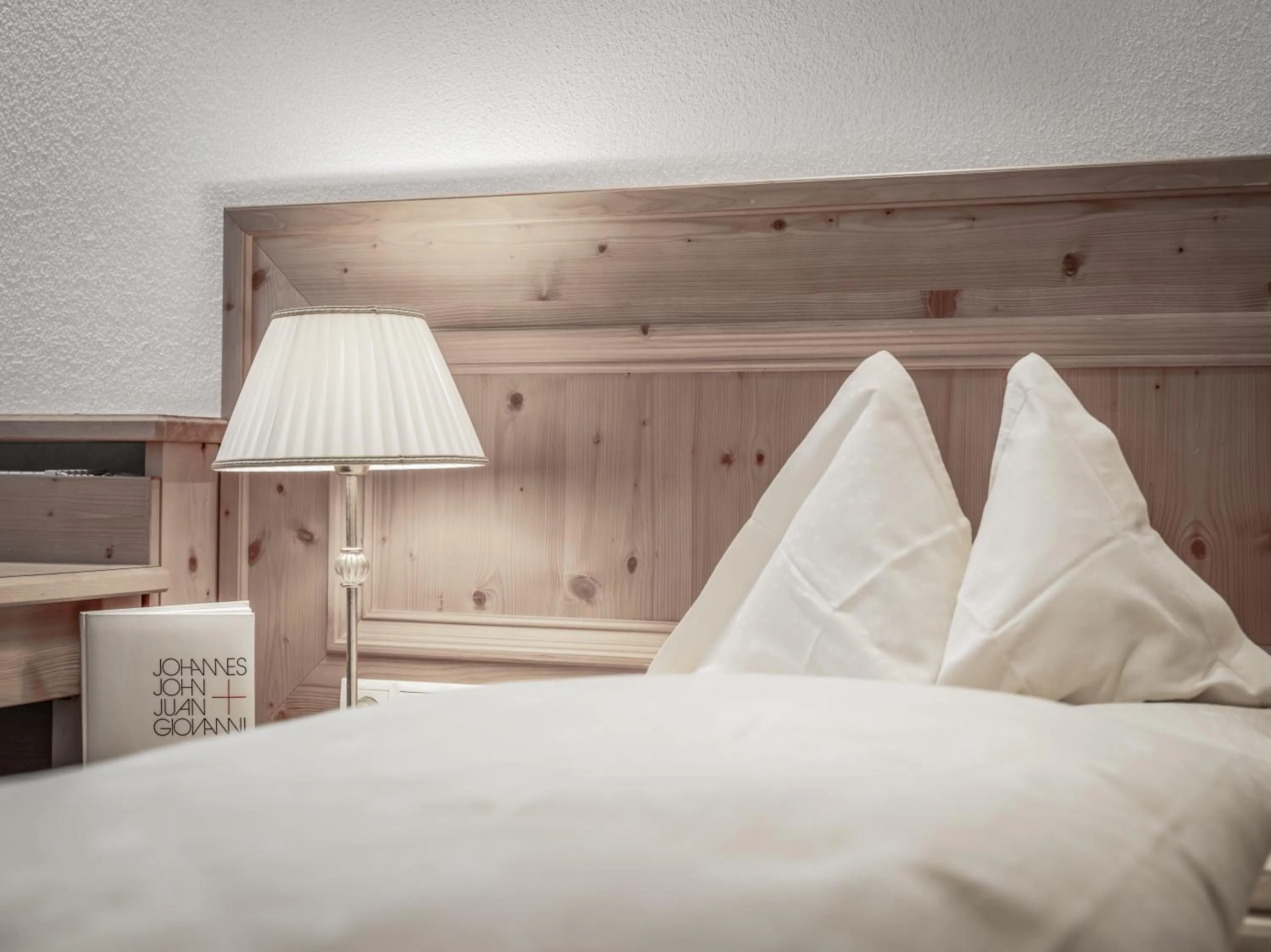 Bed in Hotel Alpenland