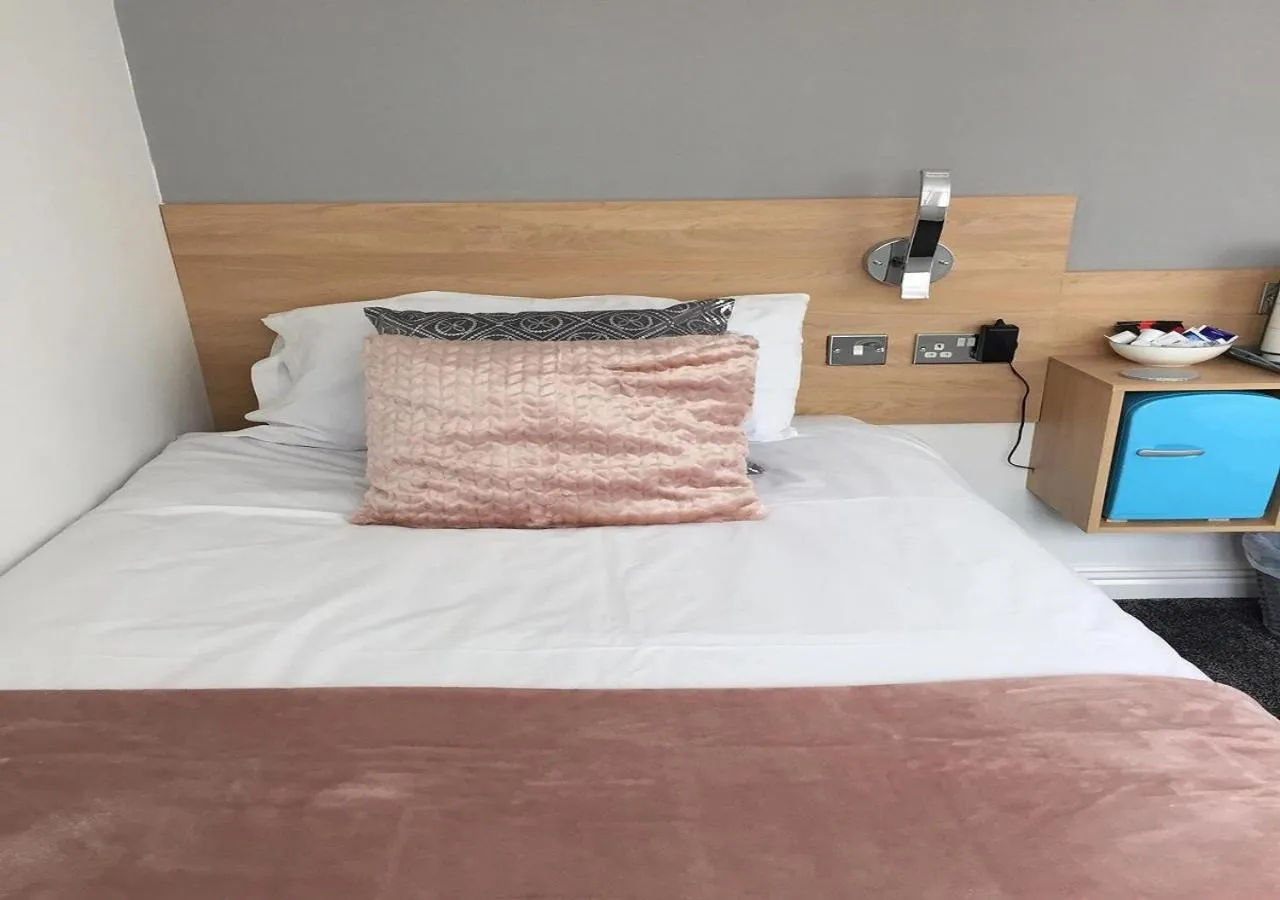 Bed in The Beaucliffe Hotel