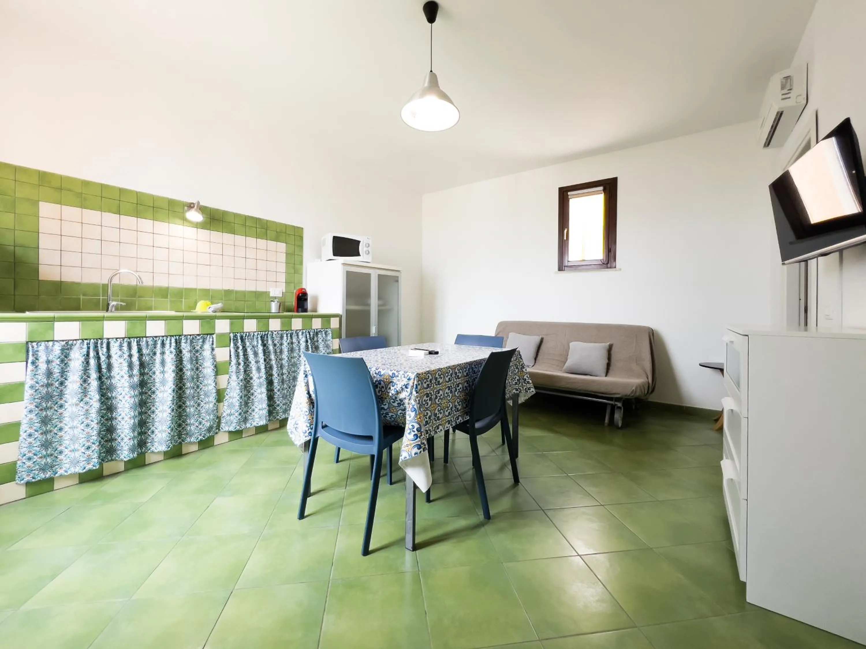 TV and multimedia in Elimi Favignana Apartments - Residence in città