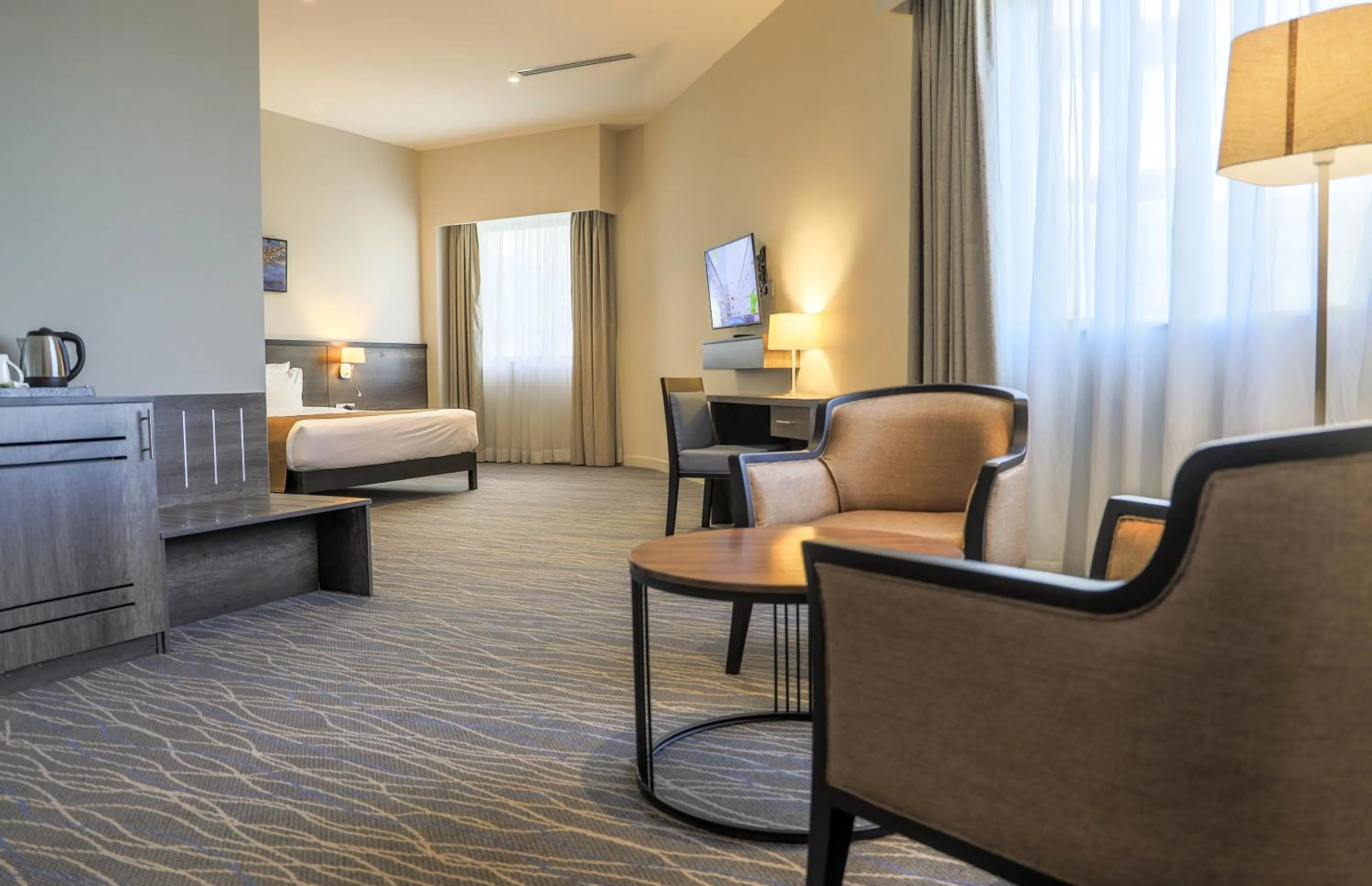 Seating area, Bed in Eka Hotel Eldoret