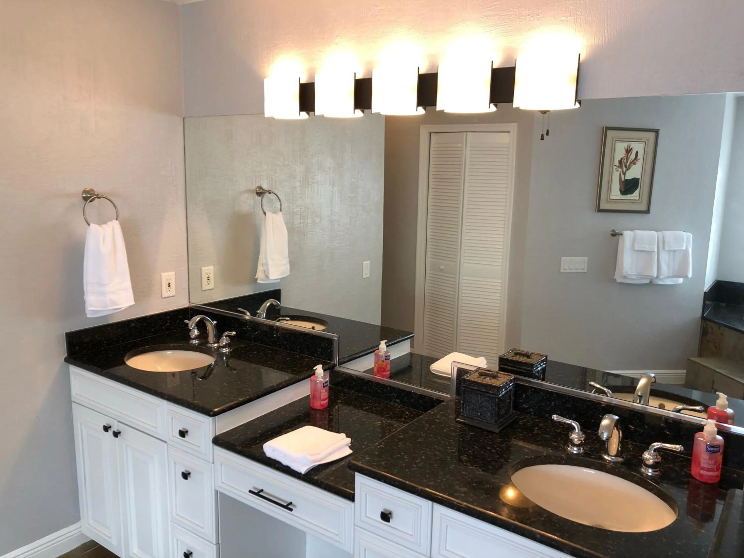 Bathroom in Tiki Paradise House & pool - 10 min to Beach!