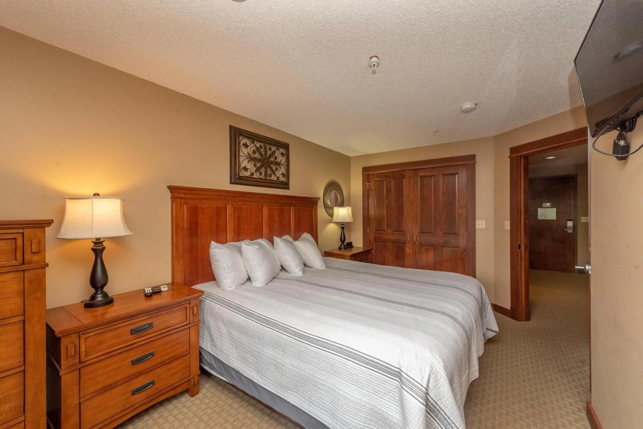 Bed in A121 One Bedroom Lake View