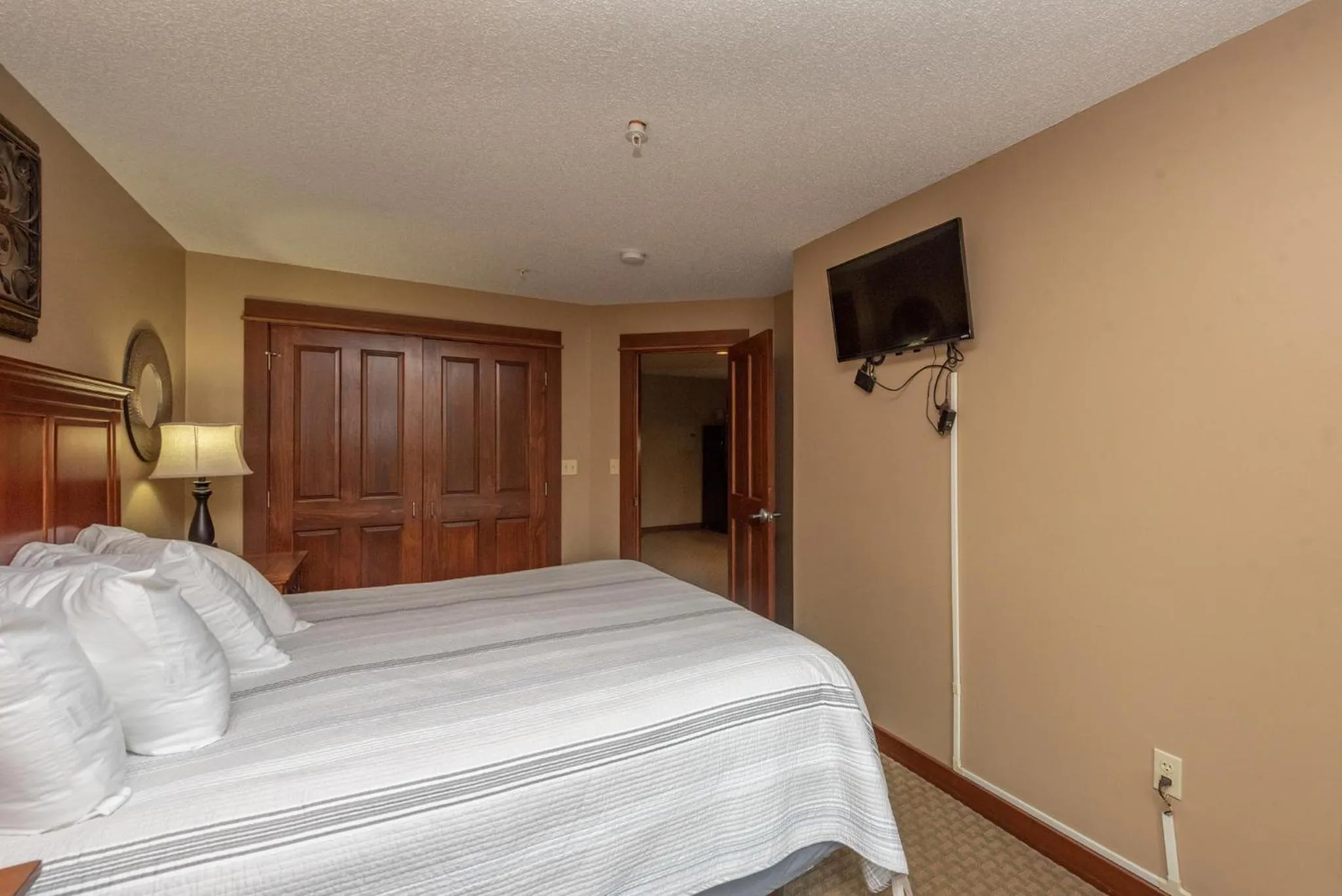 Bed in A121 One Bedroom Lake View