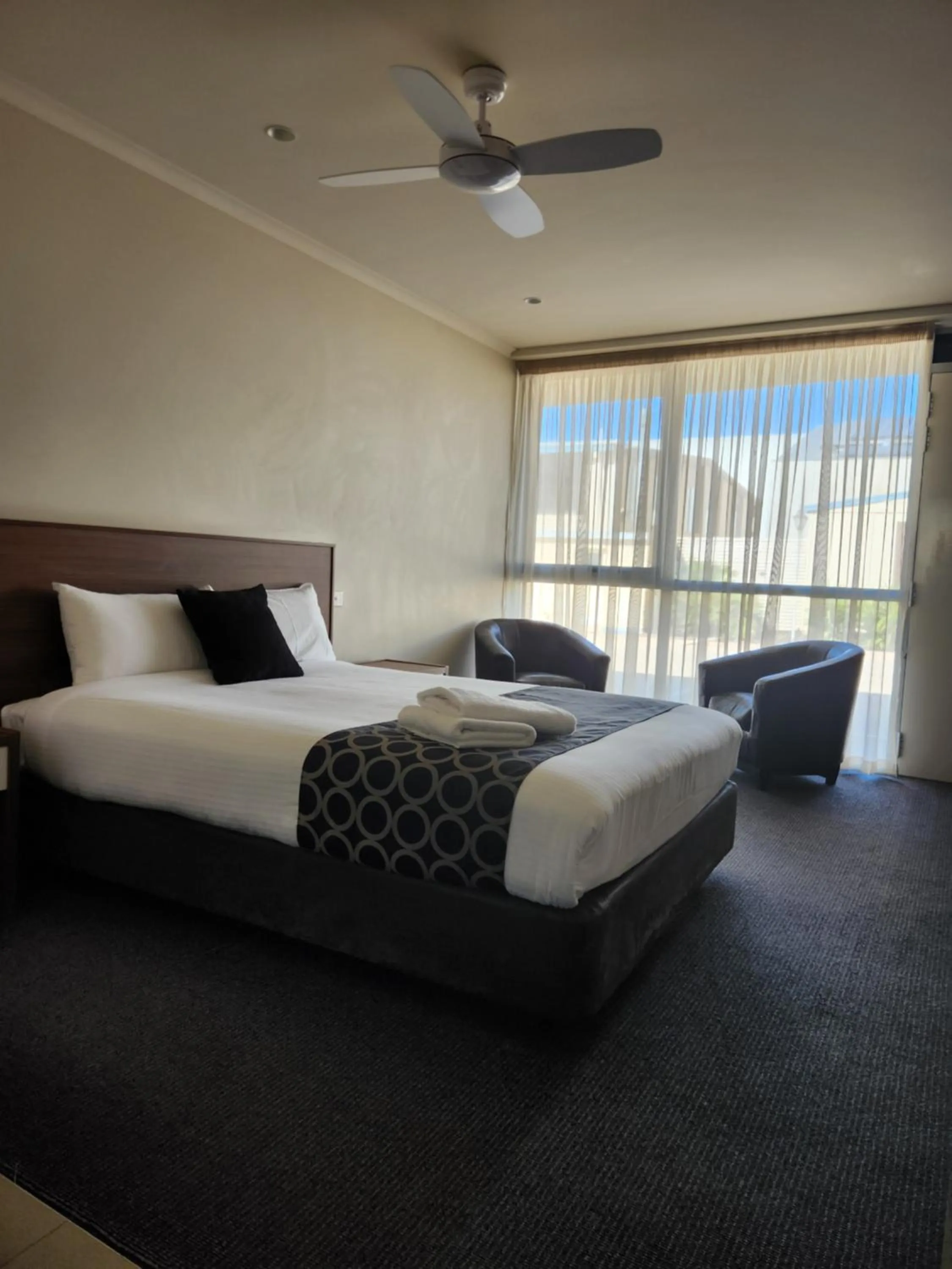 Bed in Jane Eliza Motor Inn