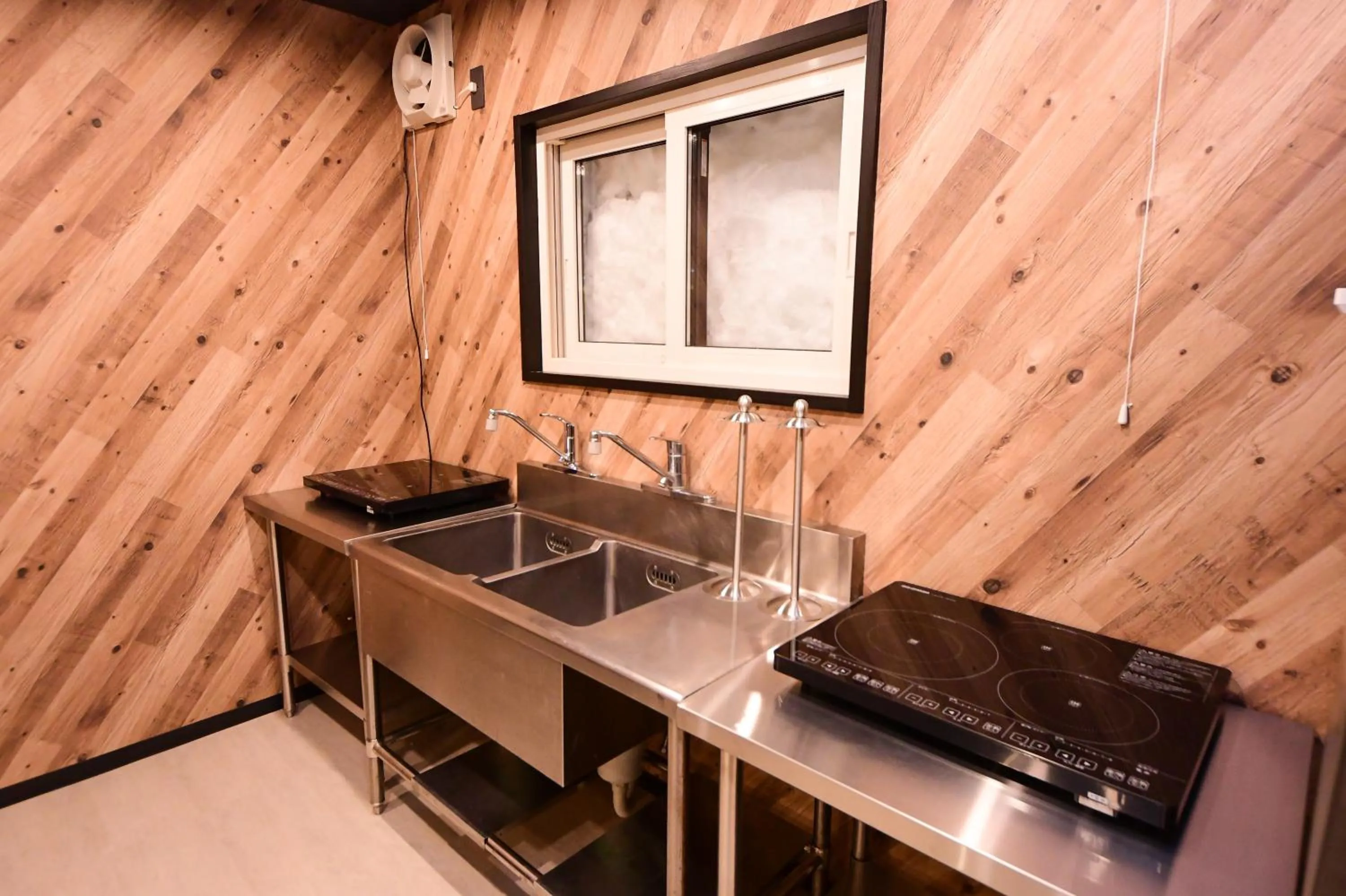 Communal kitchen in Rusutsu Grand Cabin