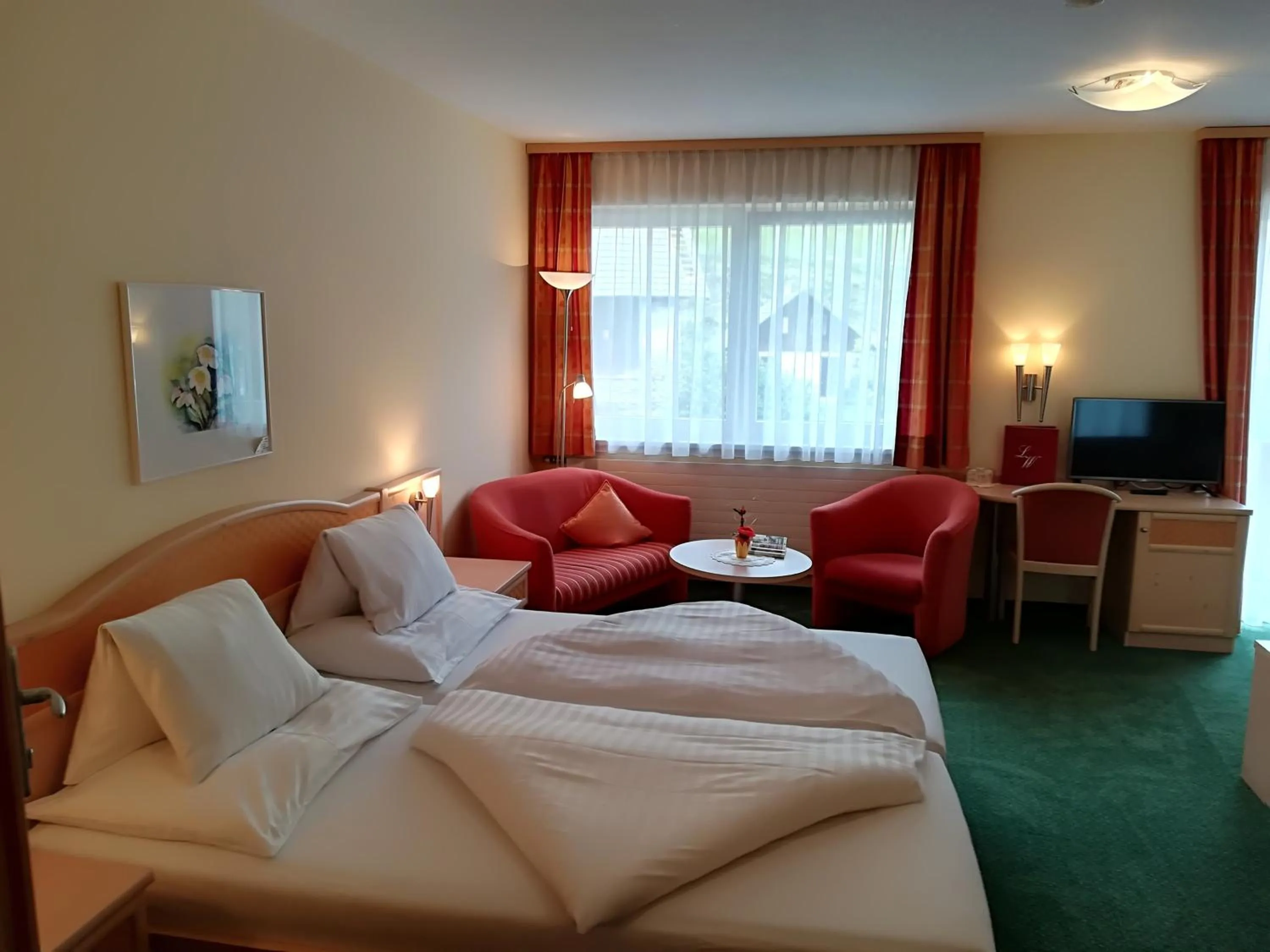 Photo of the whole room, Bed in Landhotel-Restaurant Willingshofer