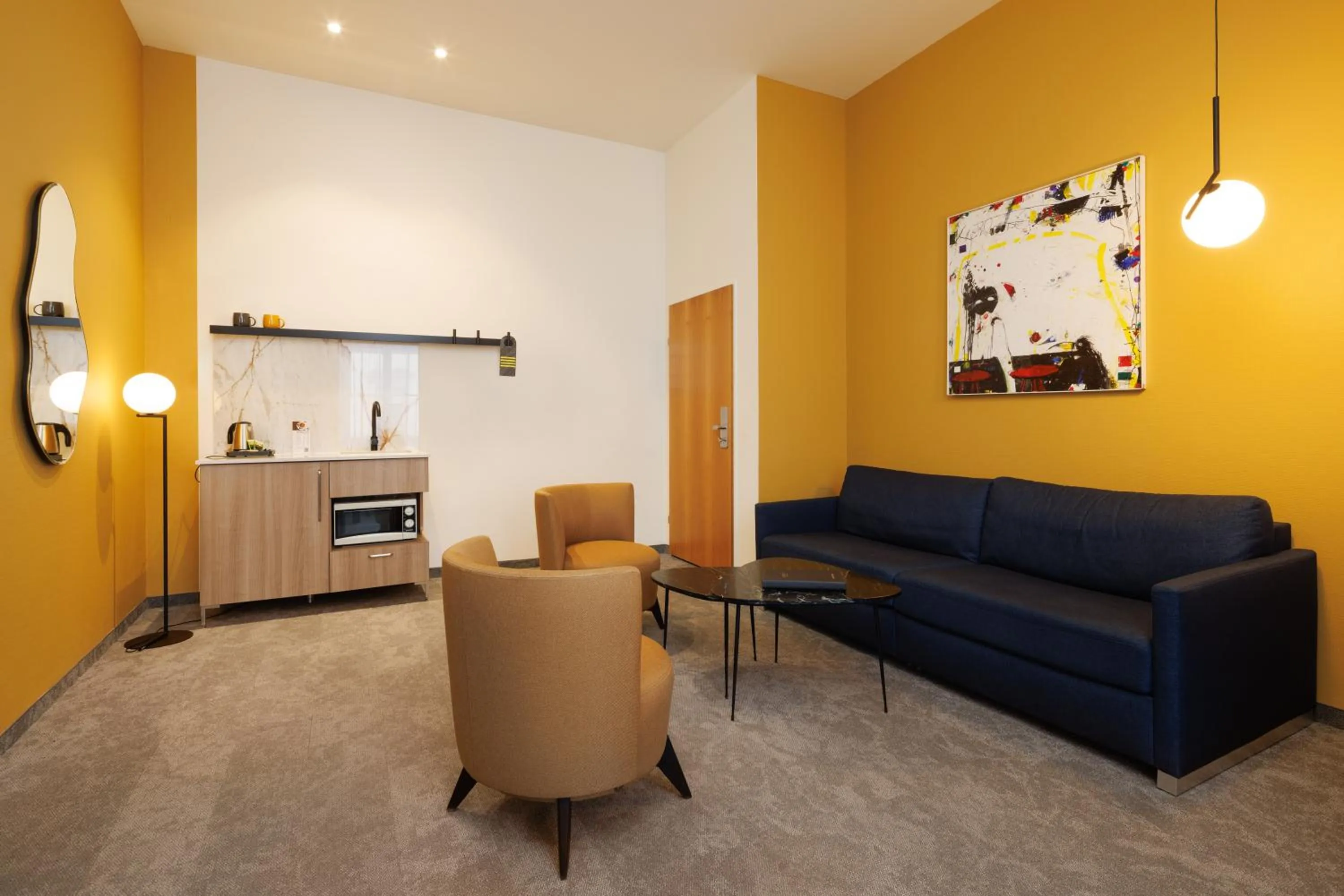 Living room in HiLight Suites Hotel