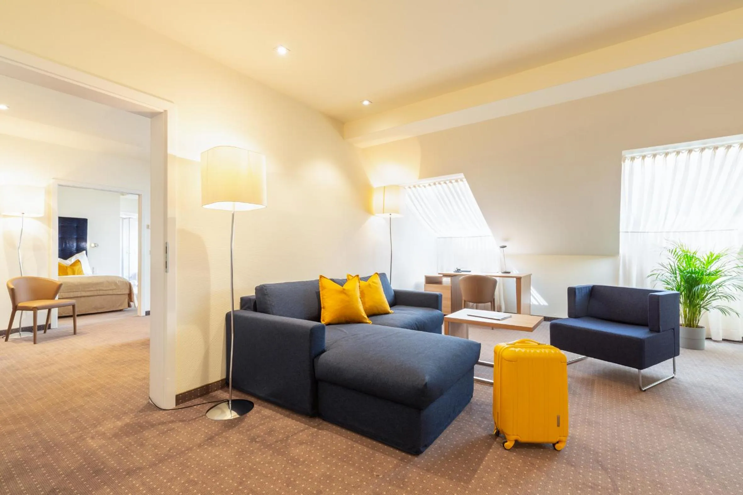 Living room in HiLight Suites Hotel