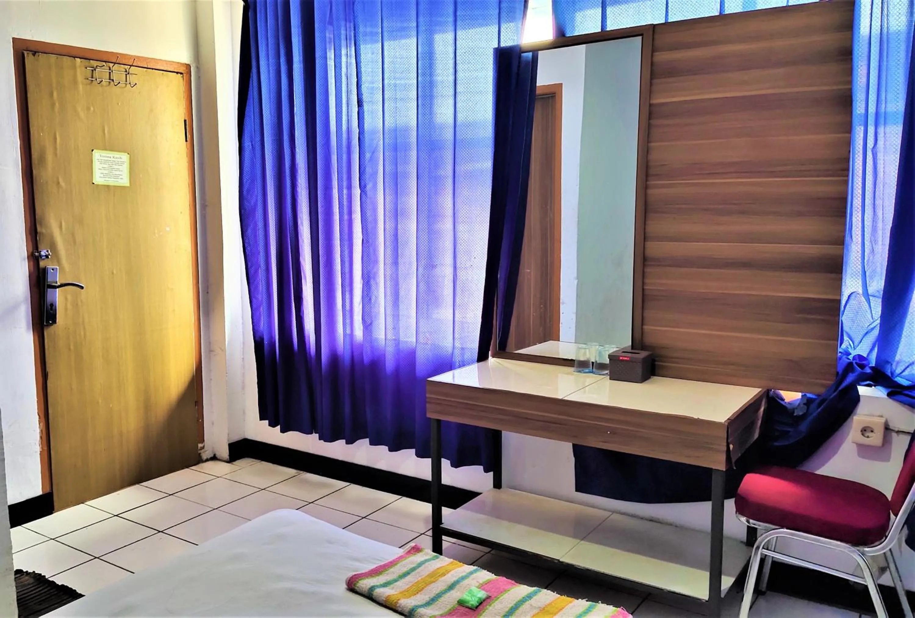 Bedroom in De' Premium Hotel Musi Raya