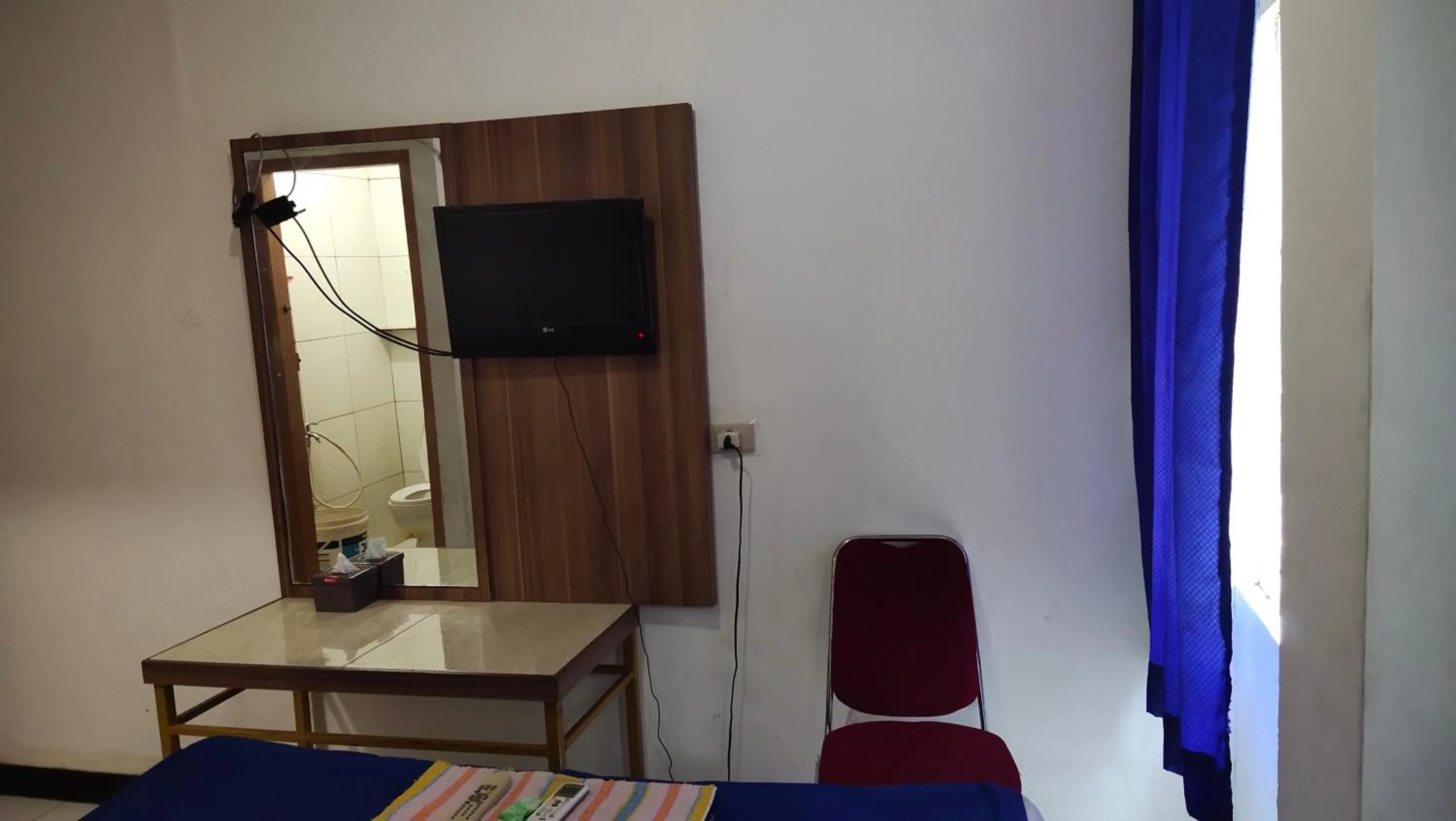 TV and multimedia in De' Premium Hotel Musi Raya