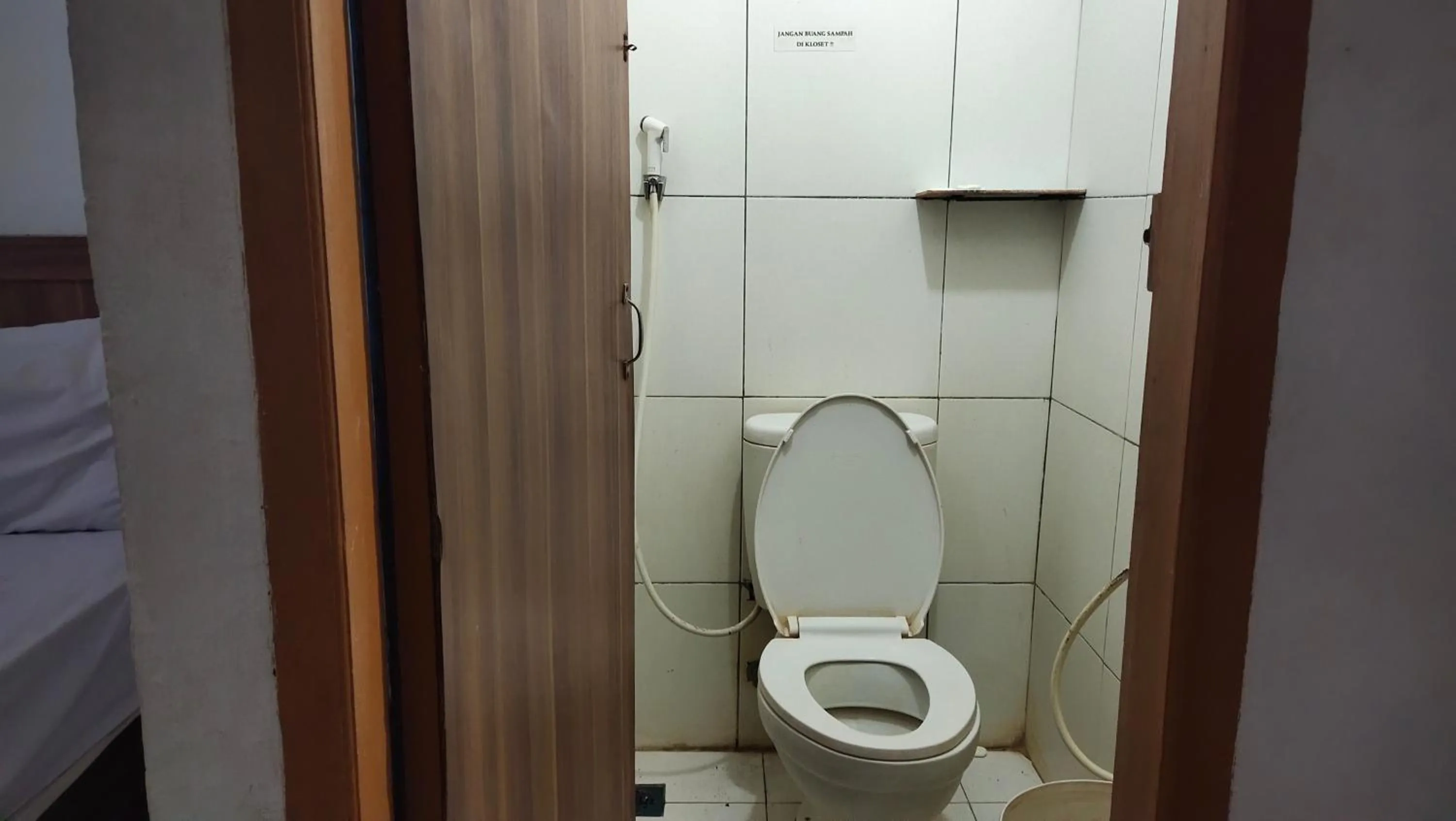 Bathroom in De' Premium Hotel Musi Raya