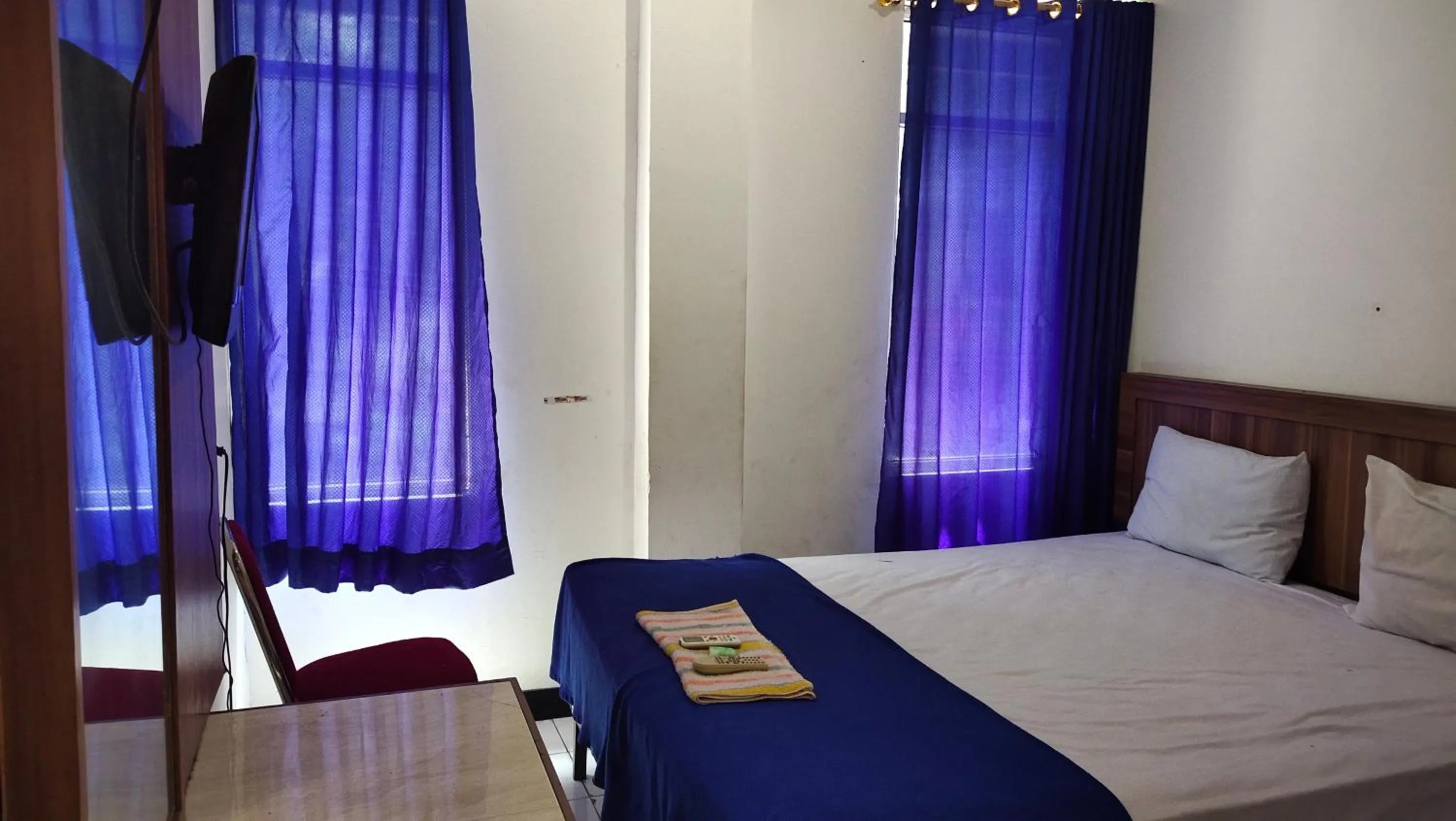 Bedroom in De' Premium Hotel Musi Raya