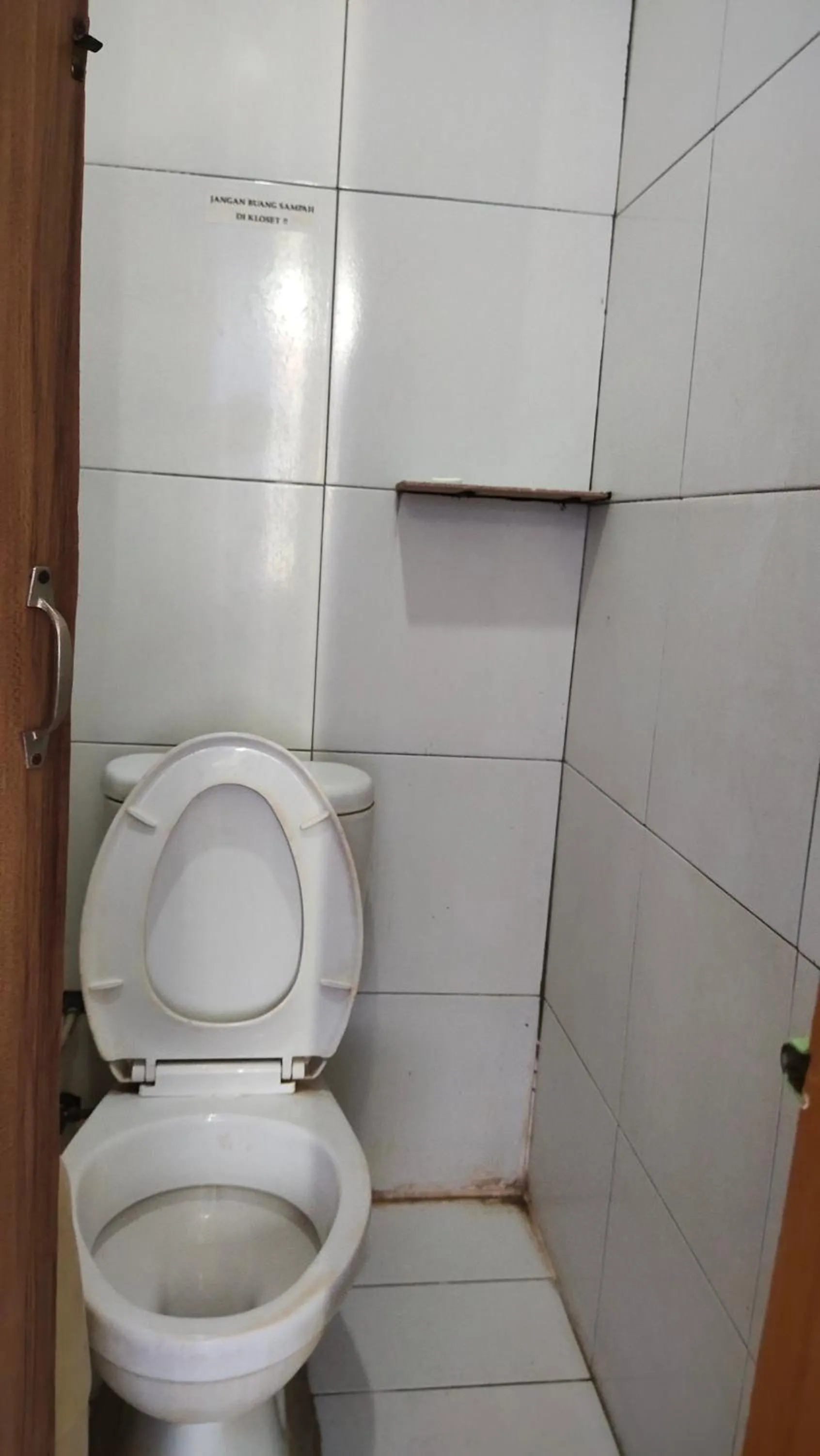 Bathroom in De' Premium Hotel Musi Raya