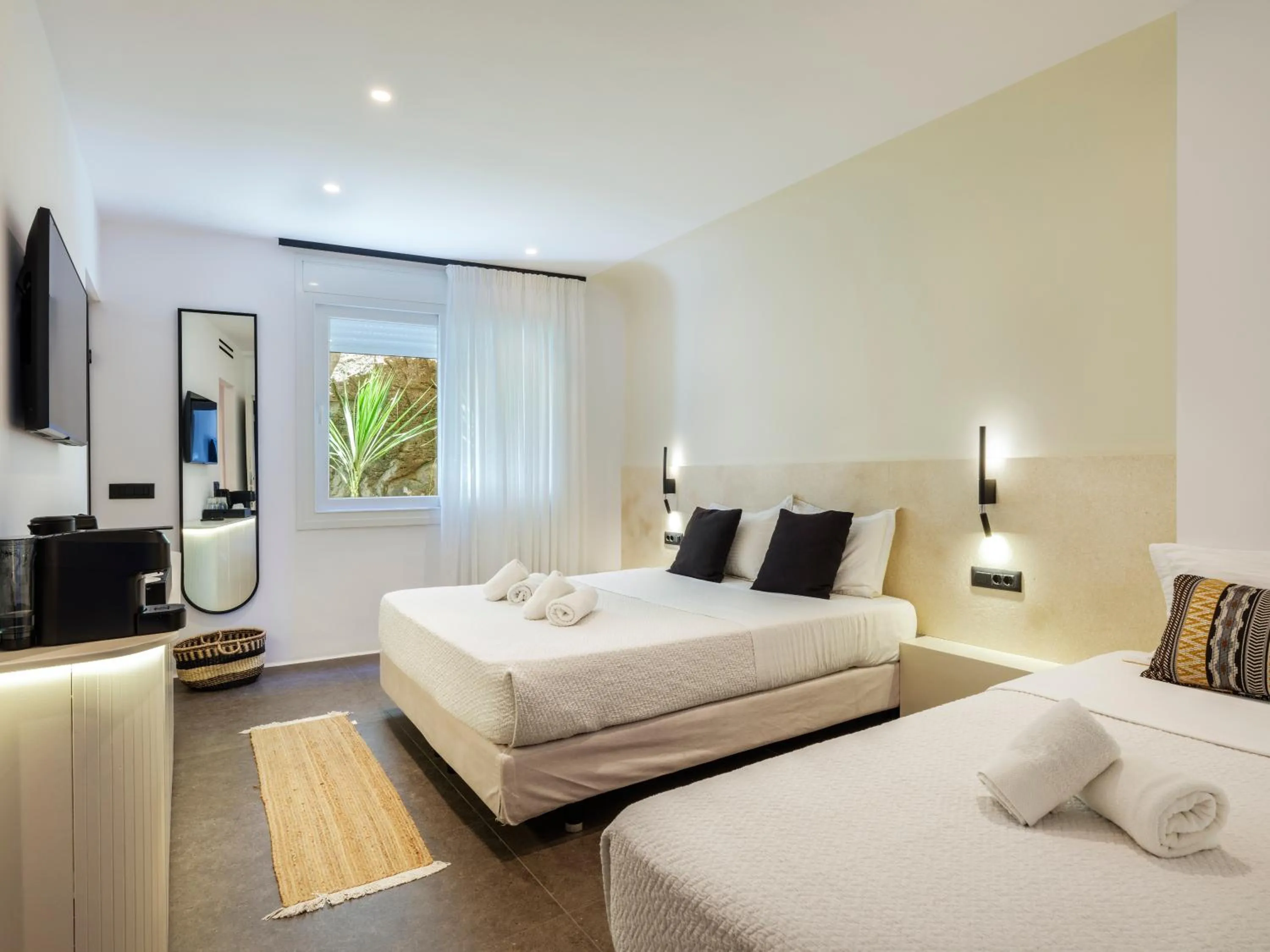 Bed in Yalos Hotel Sunset view Mykonos town private rooms