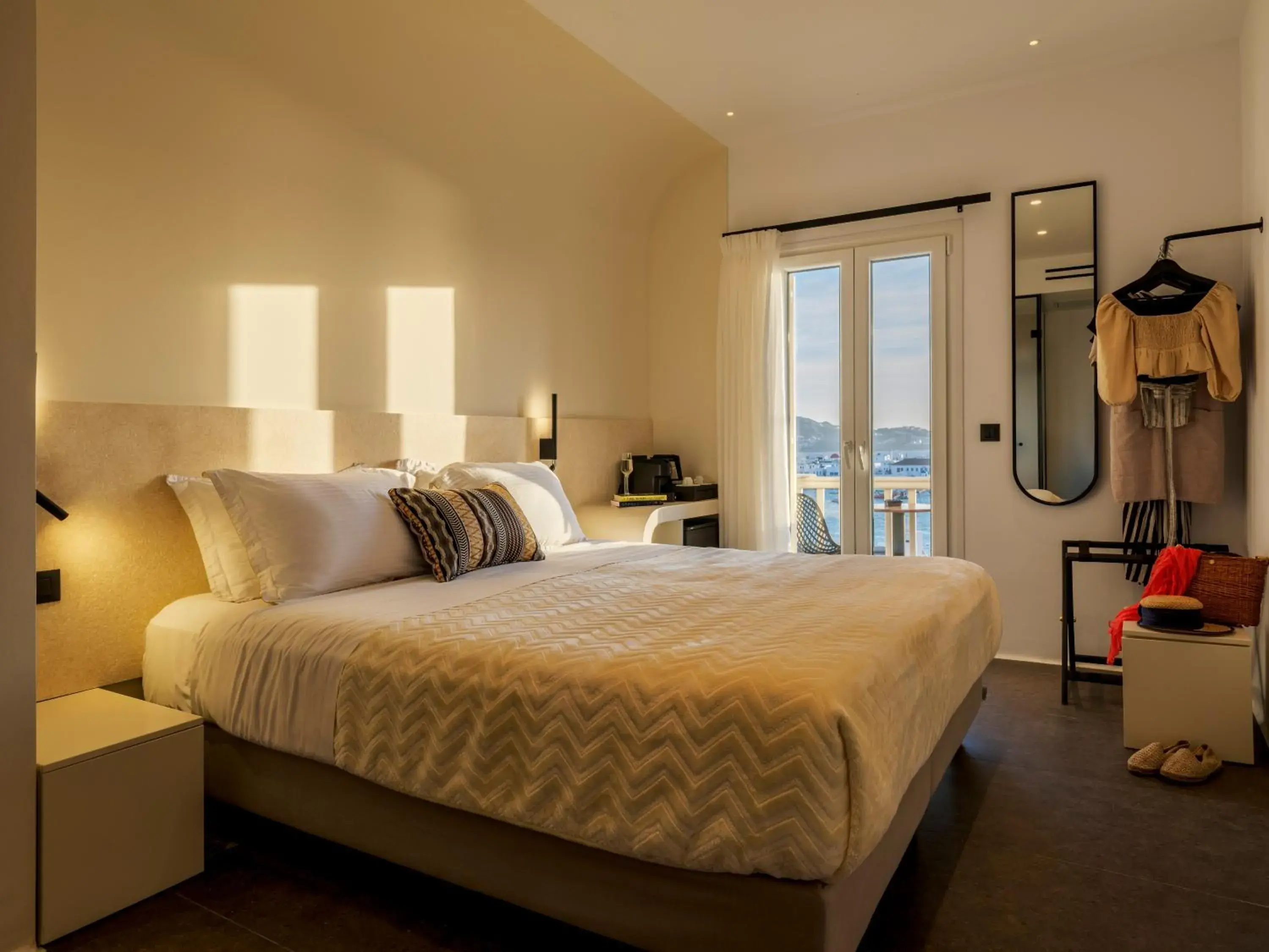 Bed in Yalos Hotel Sunset view Mykonos town private rooms Bed in Yalos Hotel Sunset view Mykonos town private rooms