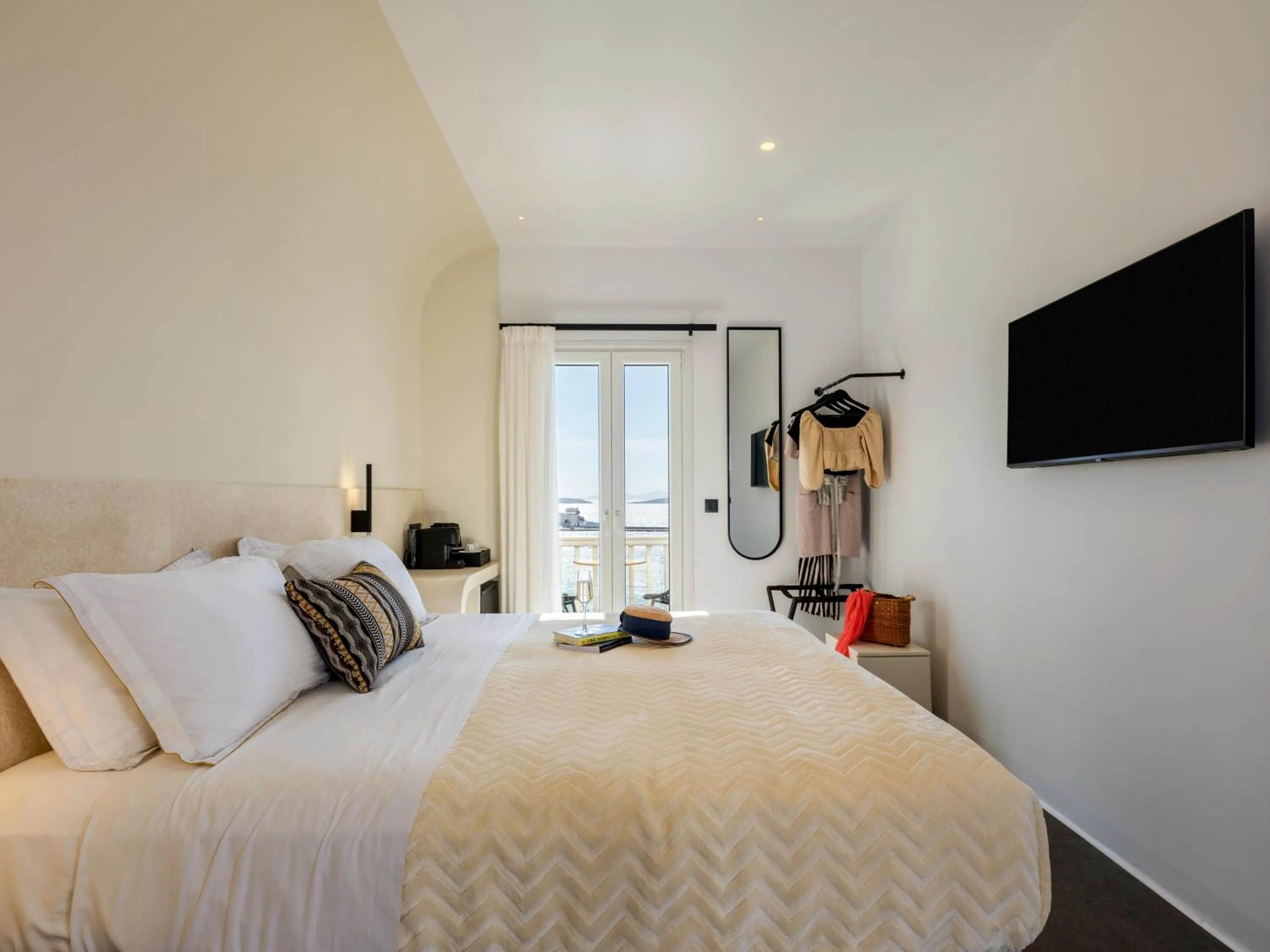 Photo of the whole room, Bed in Yalos Hotel Sunset view Mykonos town private rooms