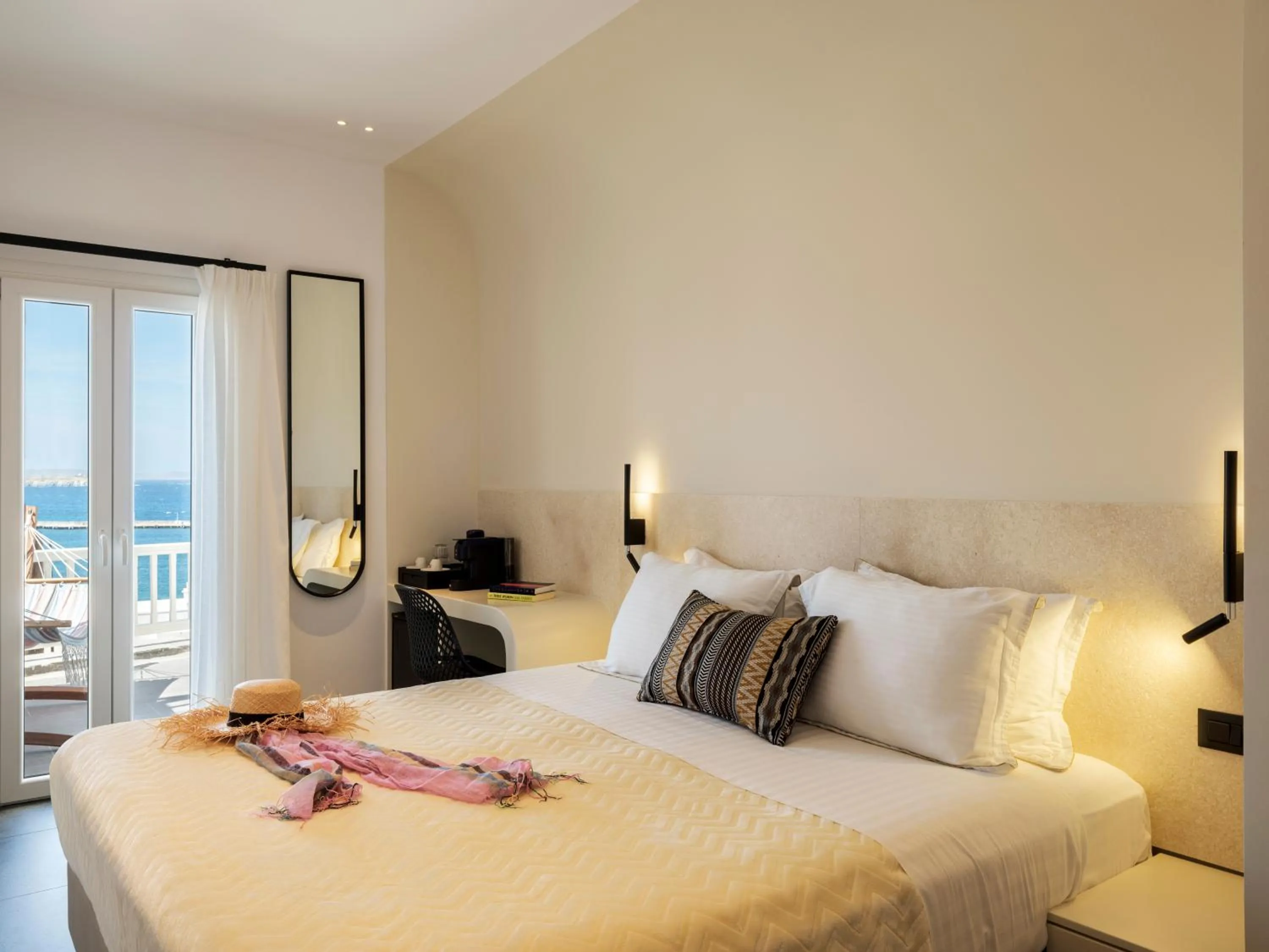 Bed in Yalos Hotel Sunset view Mykonos town private rooms