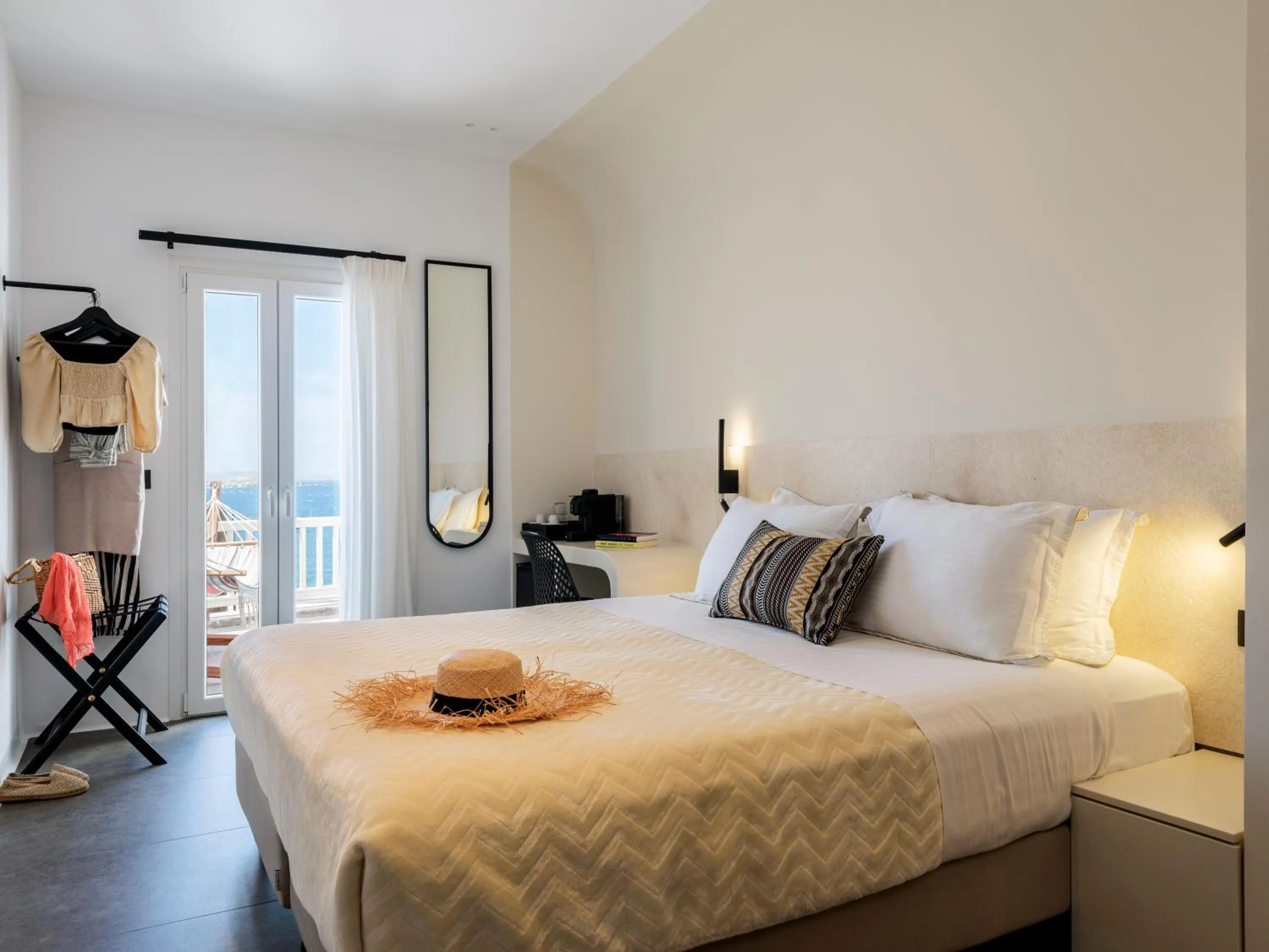 Bed in Yalos Hotel Sunset view Mykonos town private rooms