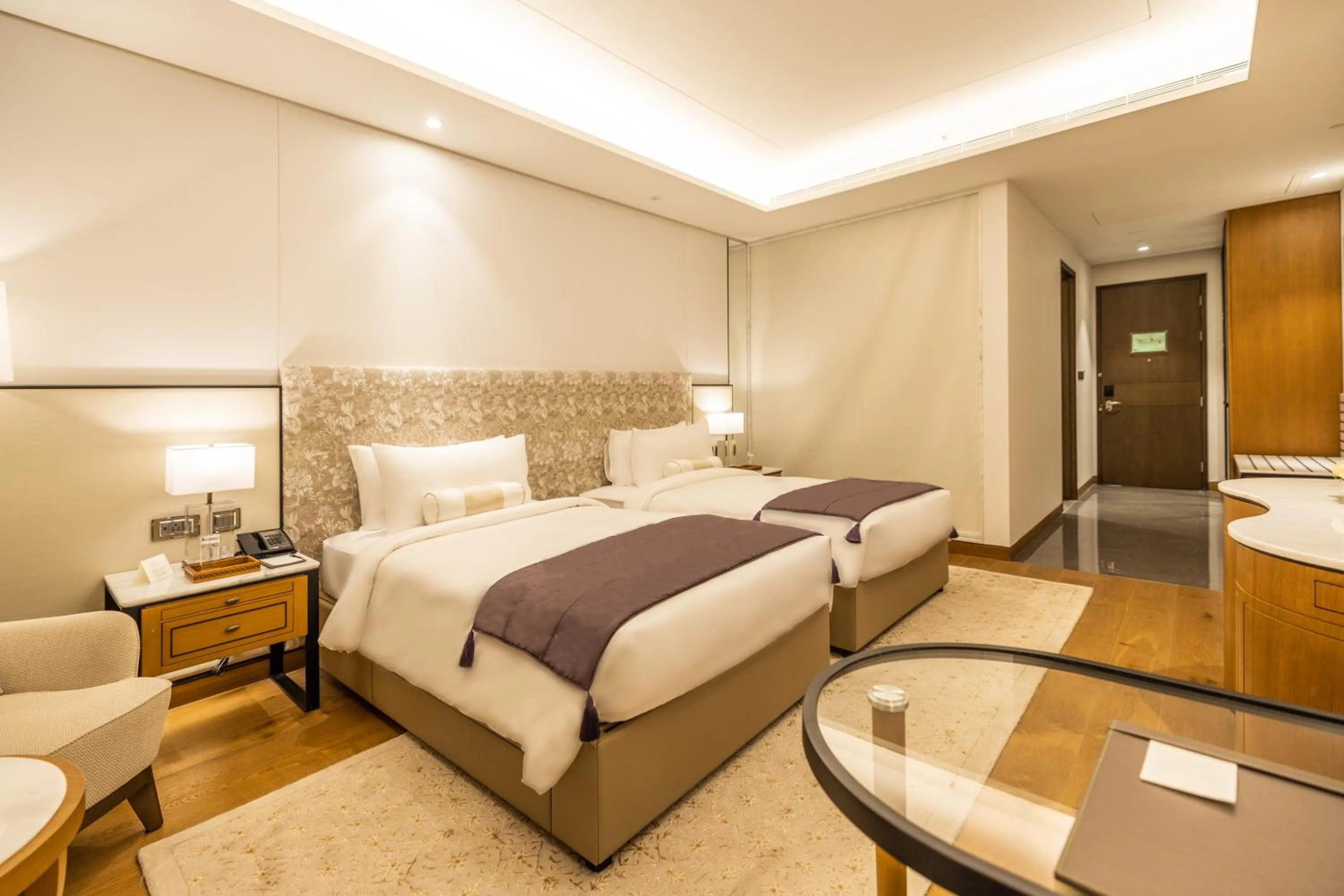 Photo of the whole room, Bed in The Leela Bhartiya City Bengaluru