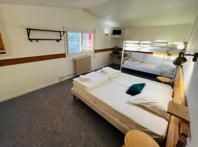 Quadruple Room with Private Bathroom in HOSTEL Les Bois Verts - Les Herbiers Quadruple Room with Private Bathroom in HOSTEL Les Bois Verts - Les Herbiers