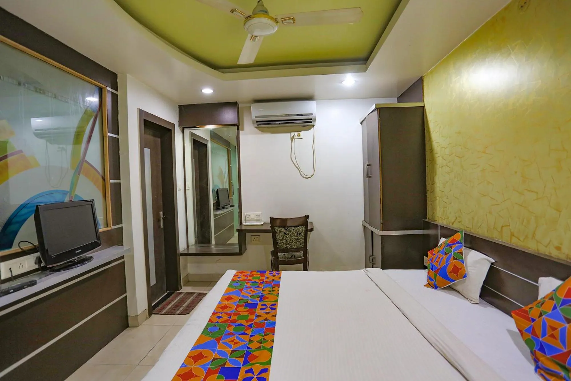 Bed in FabHotel Midland