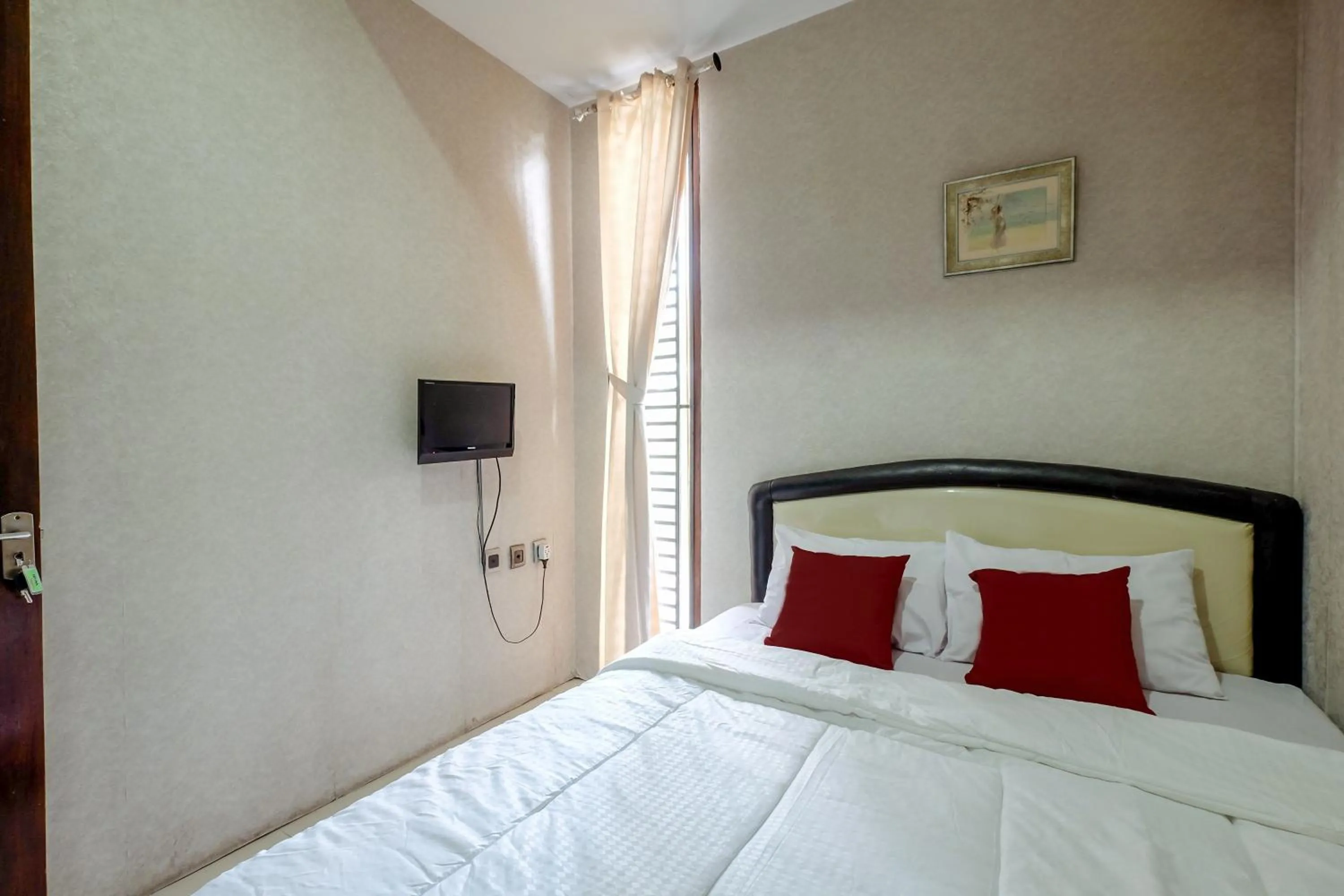 Bed in Buminanienie Guesthouse Bandung