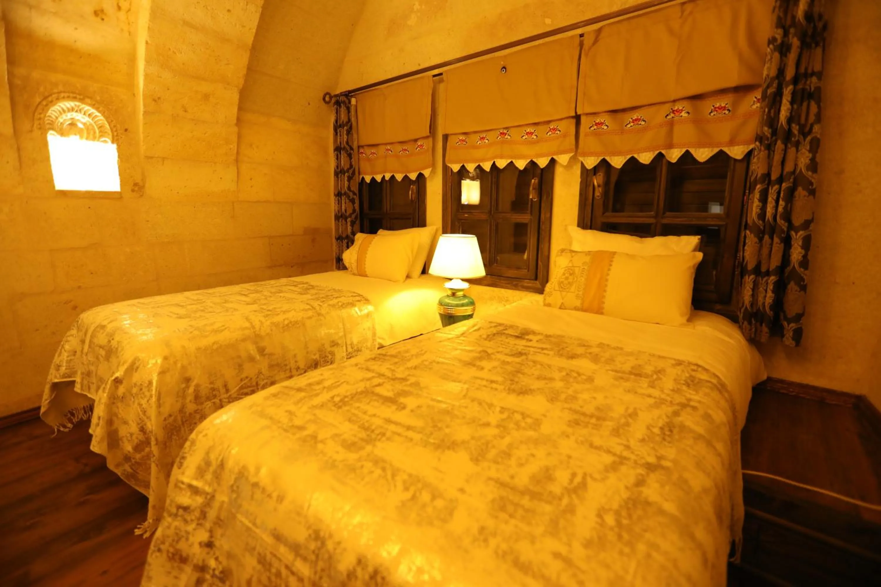 Bed in Hancı Cave Hotel