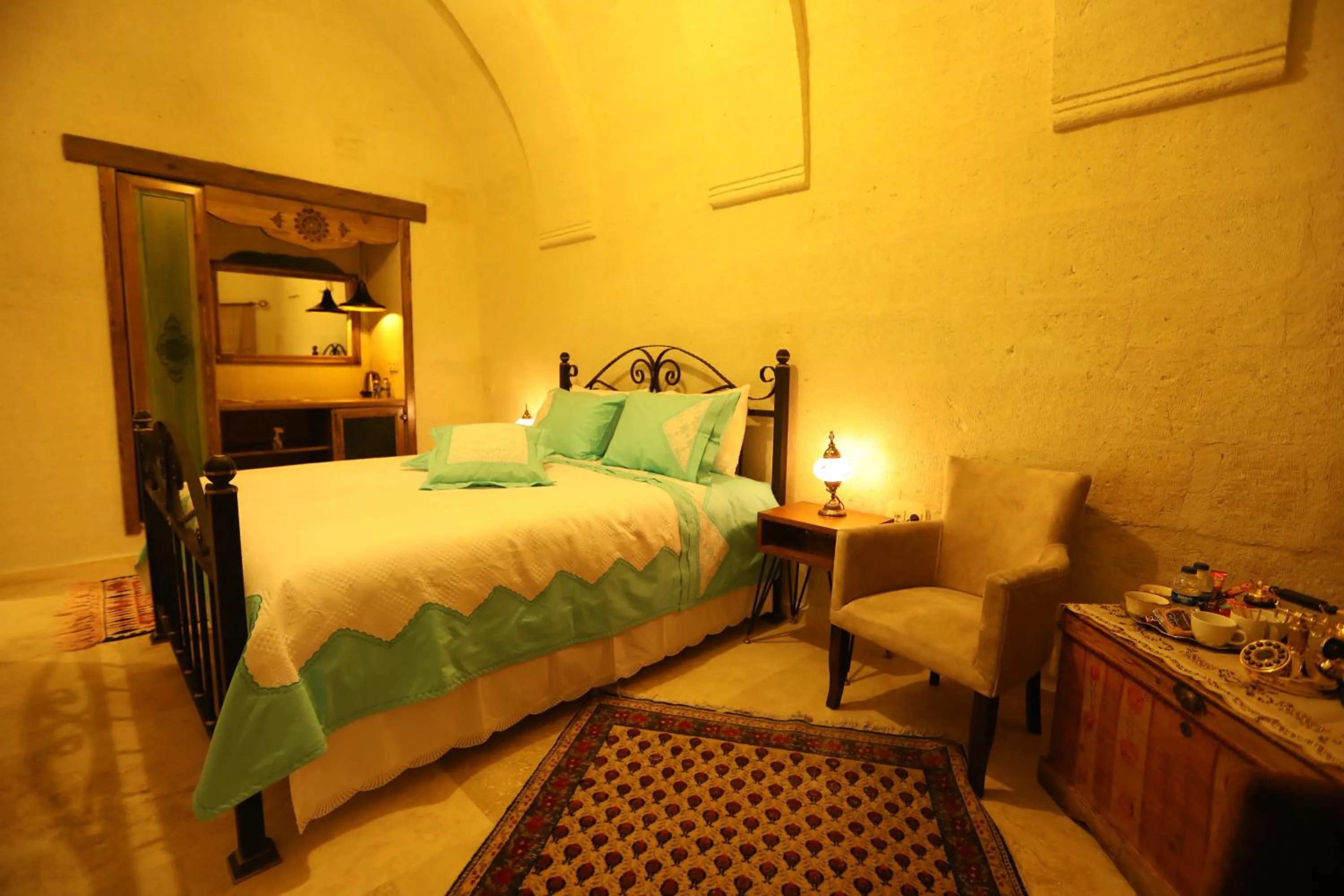 Bed in Hancı Cave Hotel