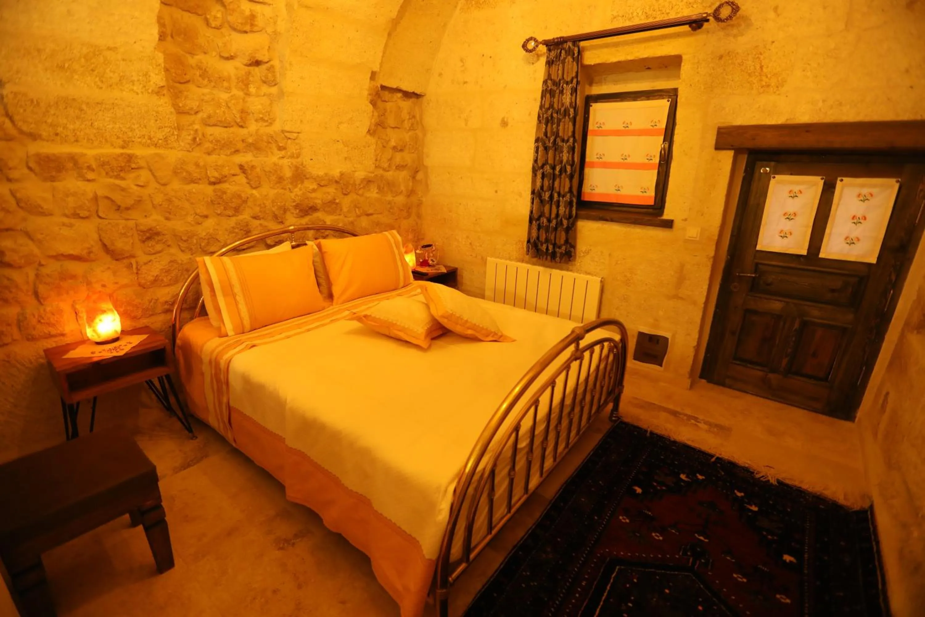 Bed in Hancı Cave Hotel