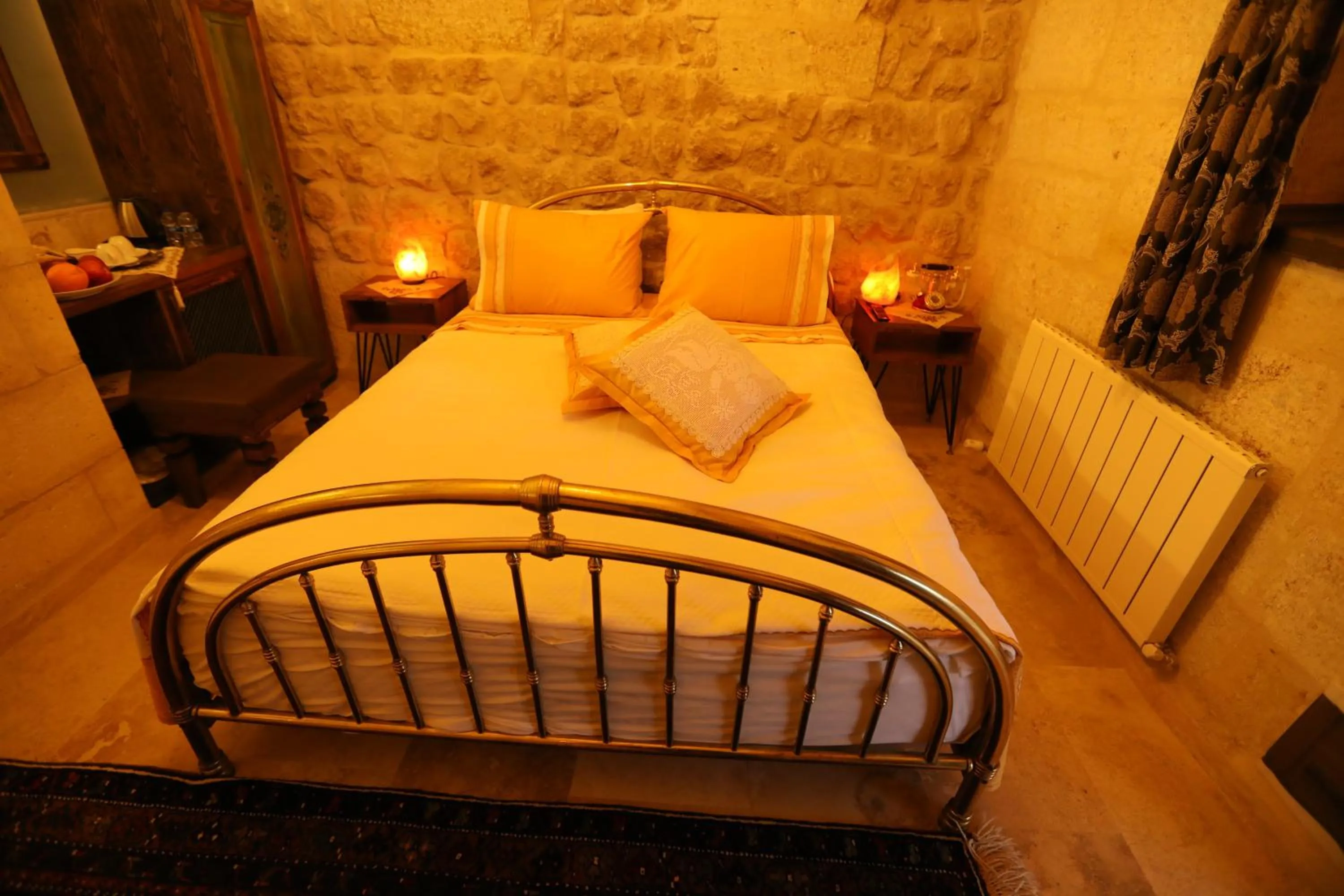 Bed in Hancı Cave Hotel