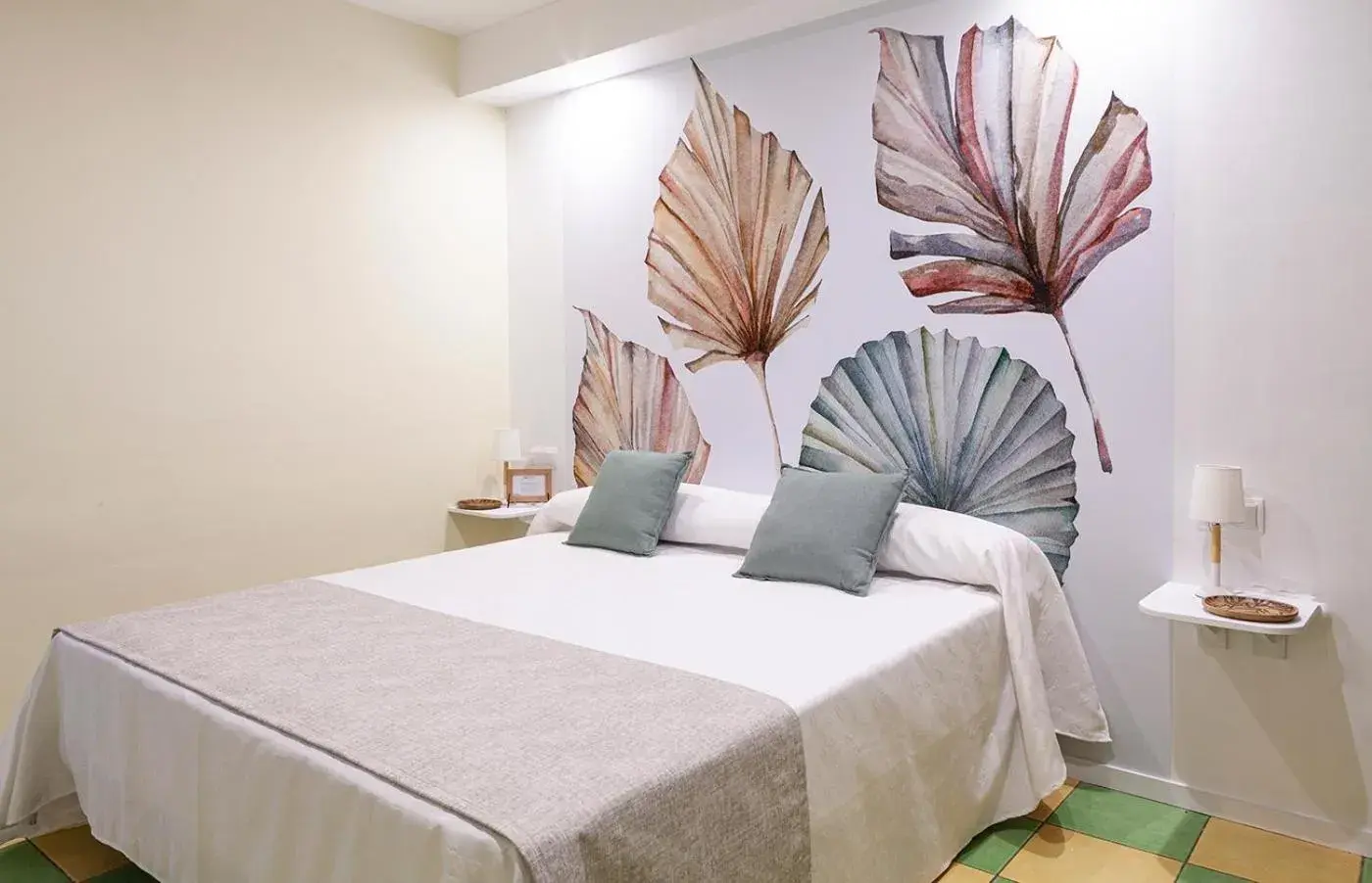 Bed in Hostal León Dormido Bed in Hostal León Dormido