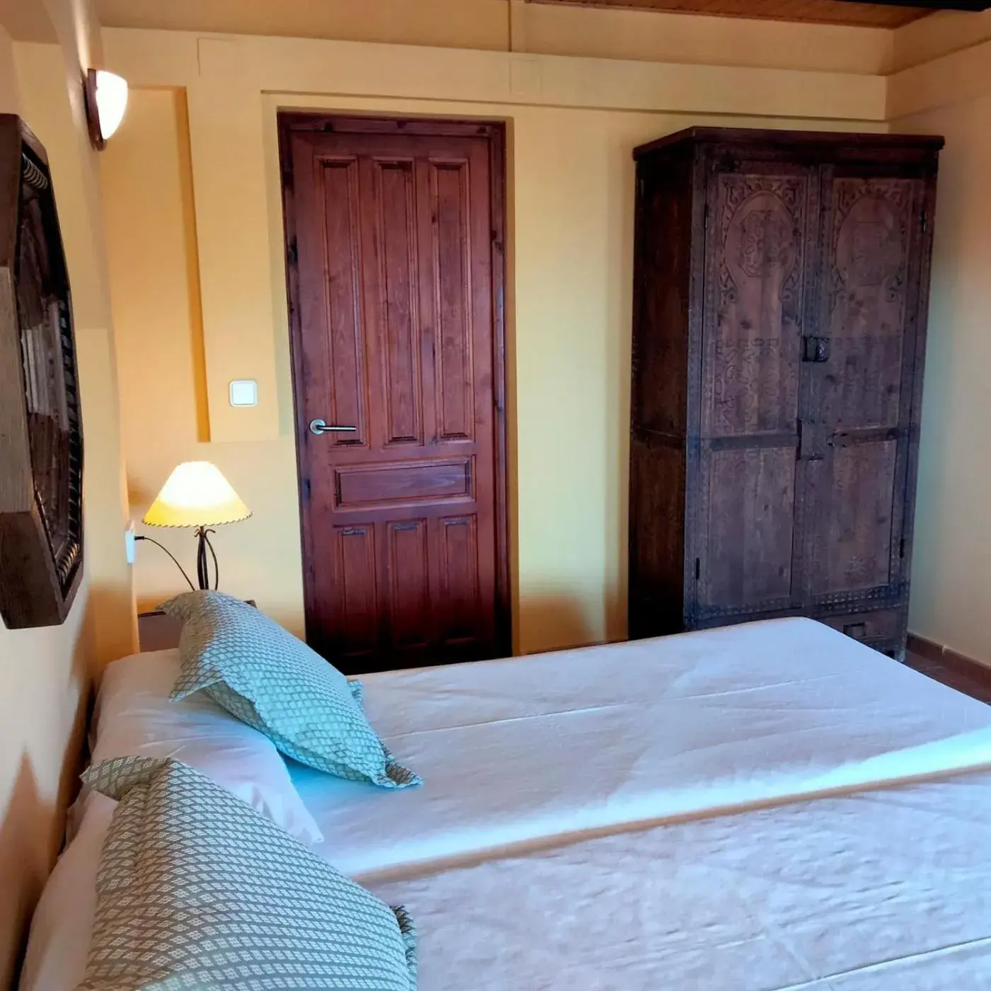 Bed in Hostal León Dormido Bed in Hostal León Dormido