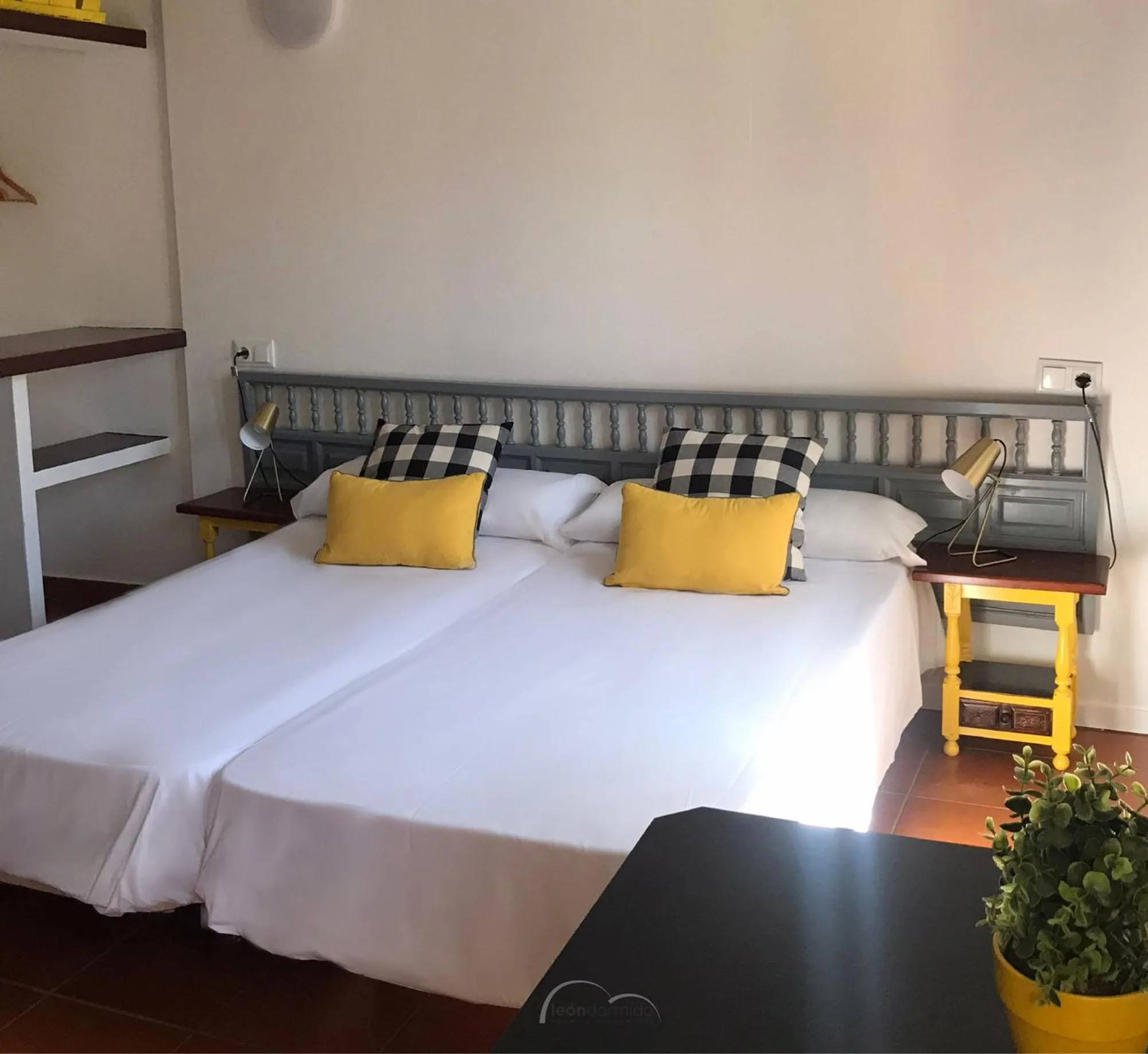 Bed in Hostal León Dormido