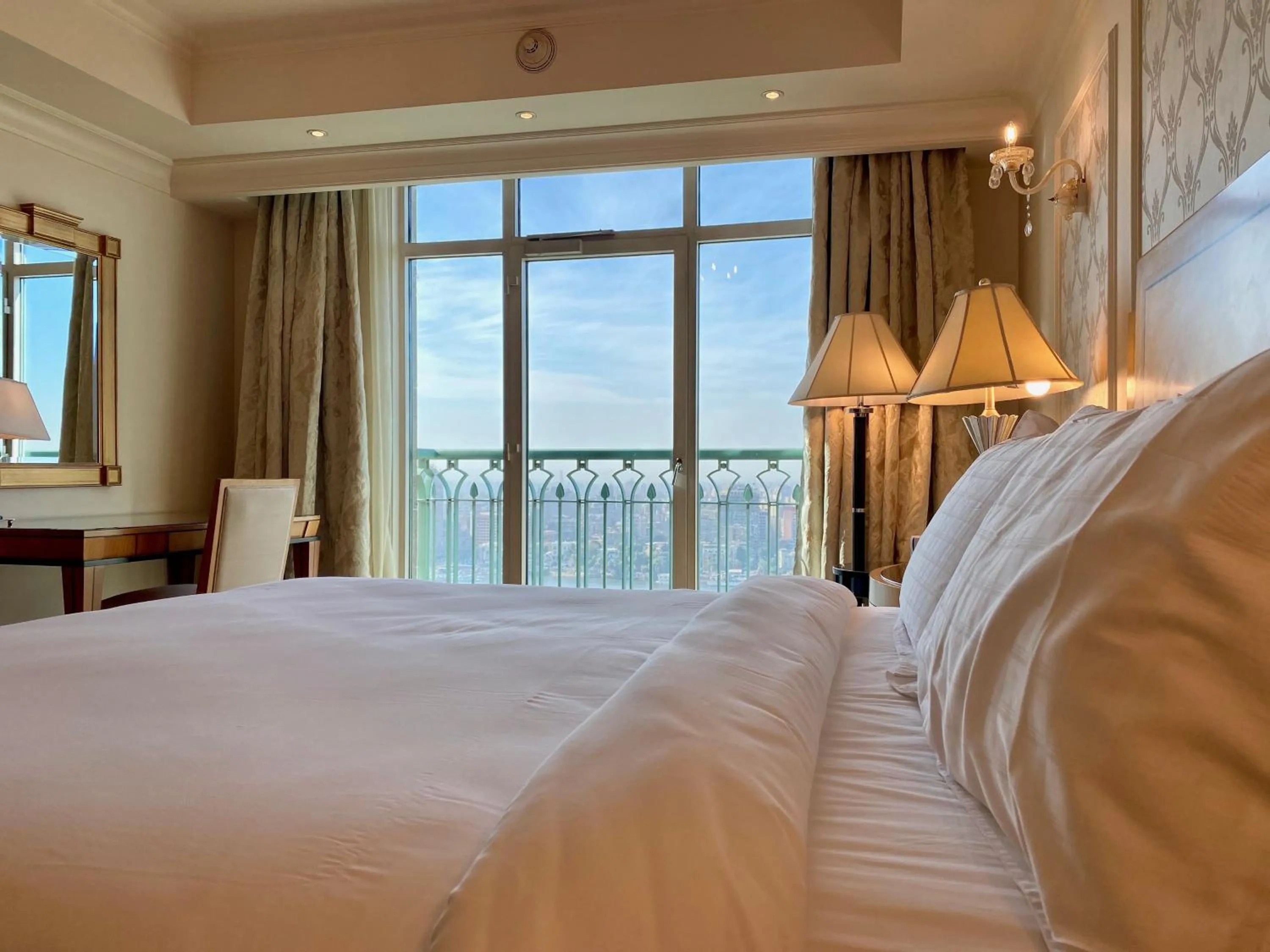 Bed in Chez Haytham At Four Seasons Nile Plaza Residential Suite