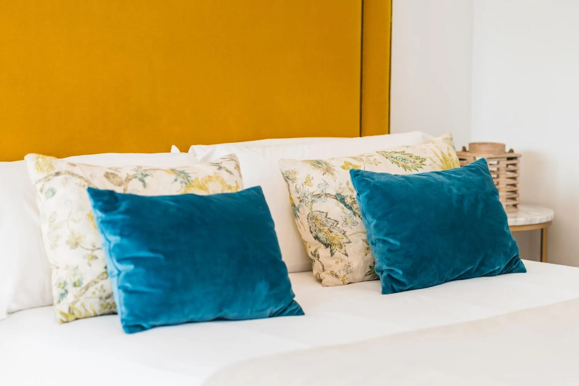 Bed in Debambú Suites