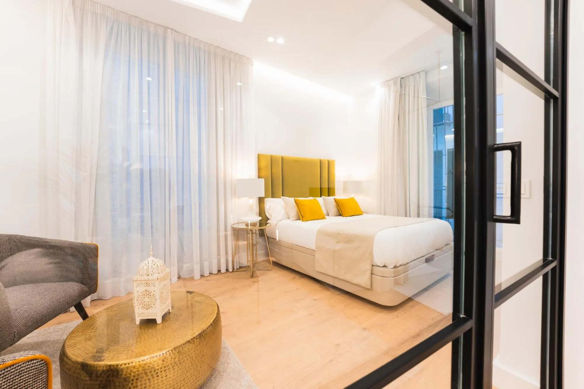 Bed in Debambú Suites