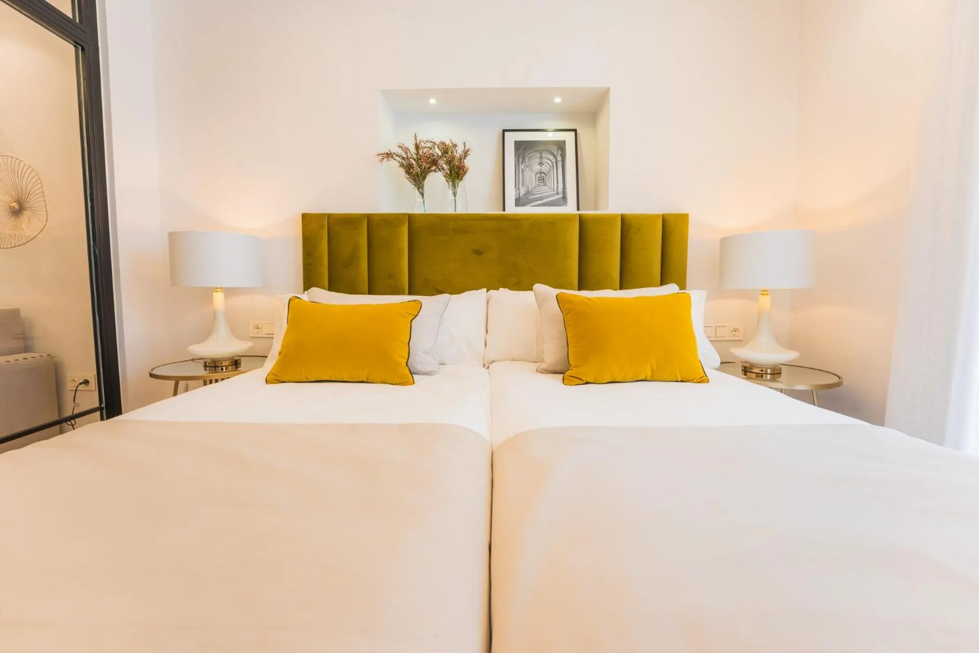 Bed in Debambú Suites