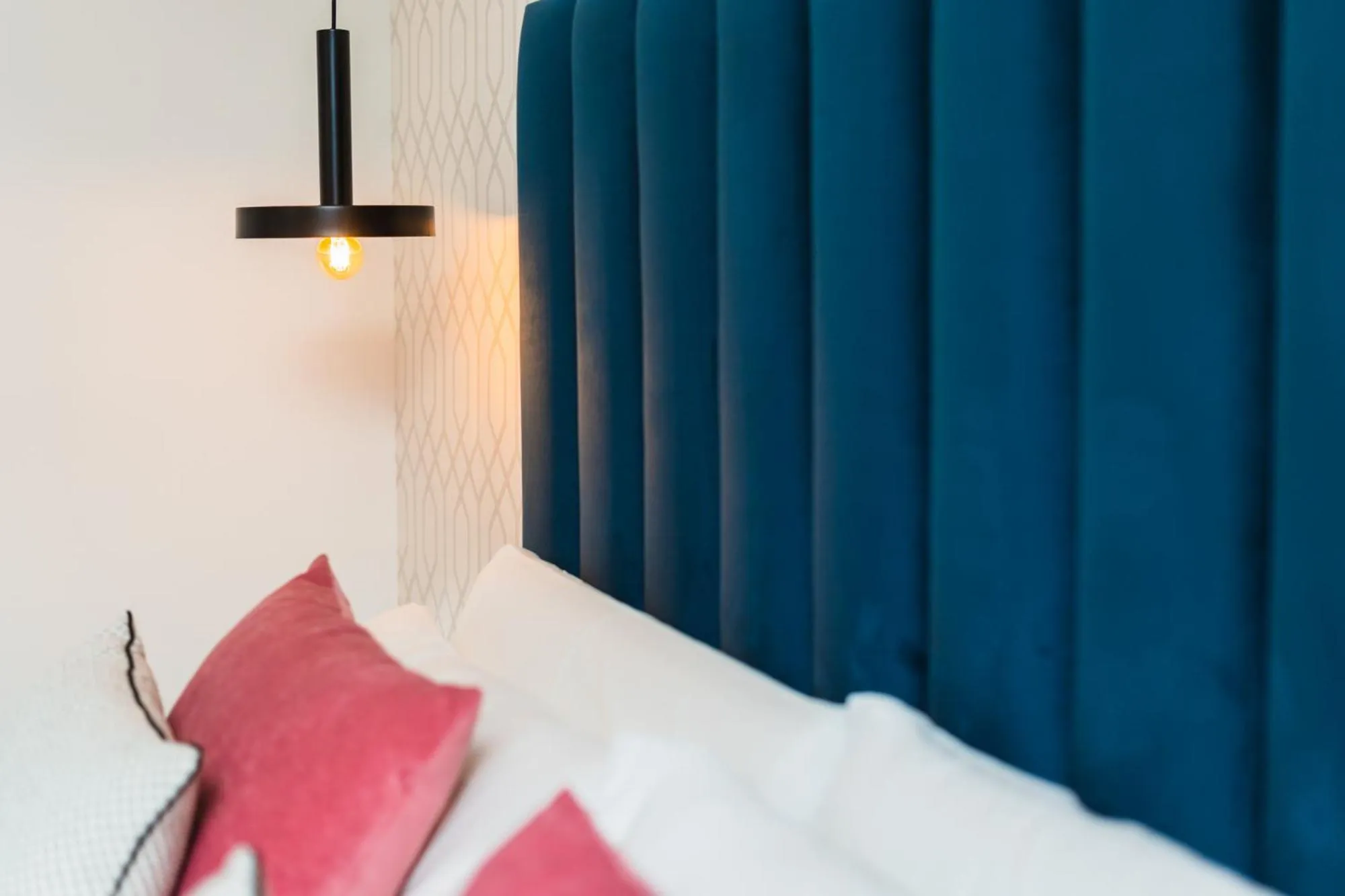 Bed in Debambú Suites