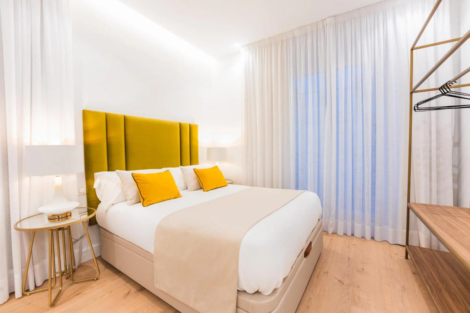 Bed in Debambú Suites