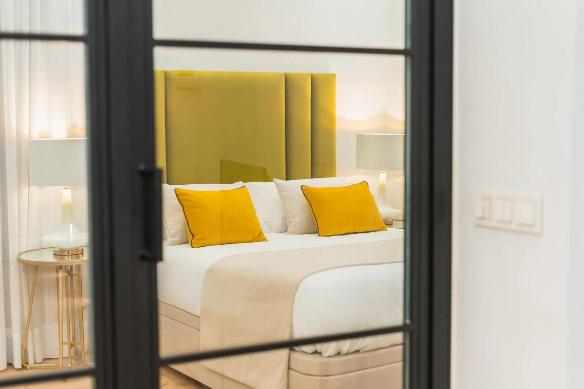 Bed in Debambú Suites