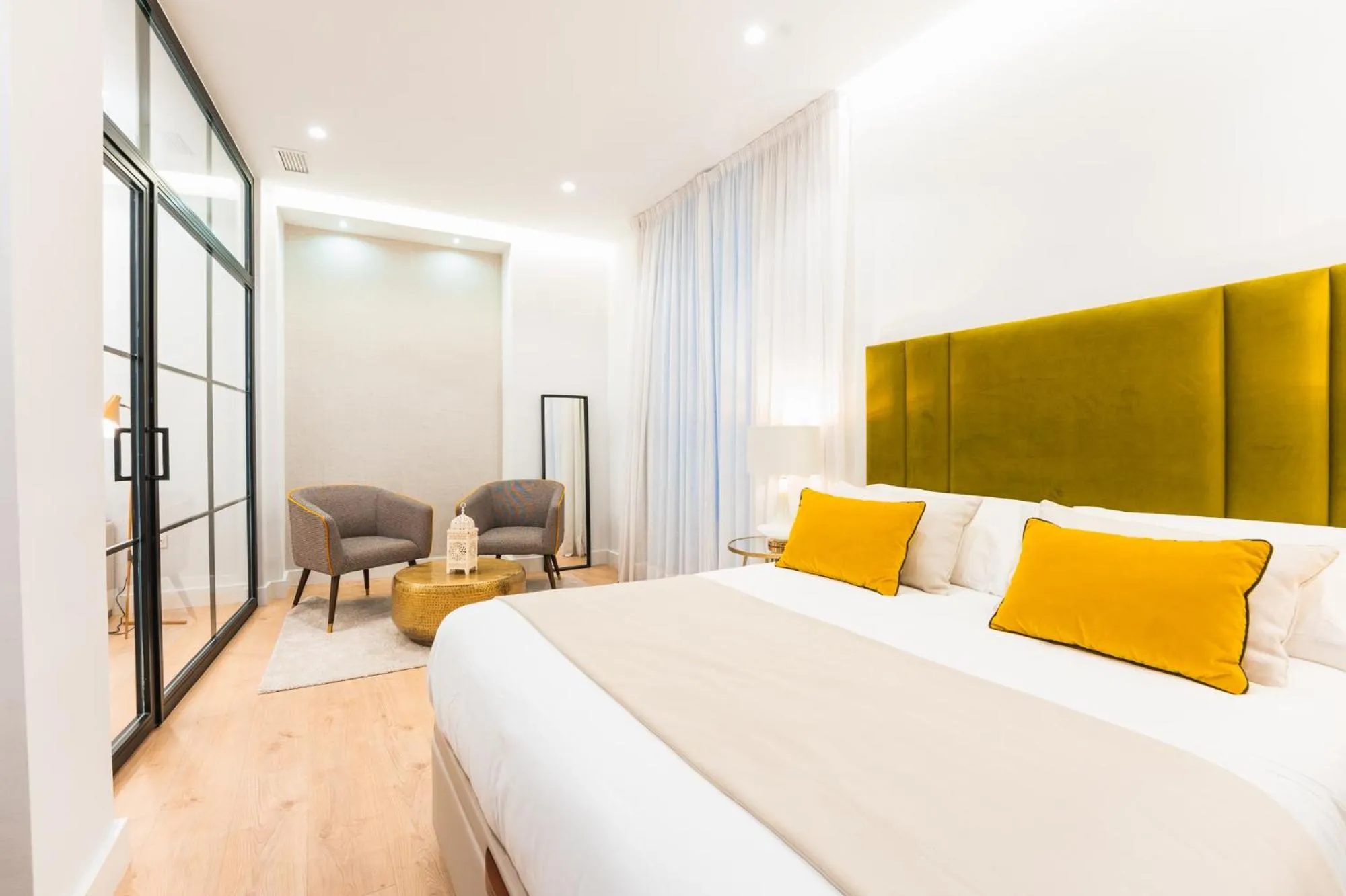 Bed in Debambú Suites